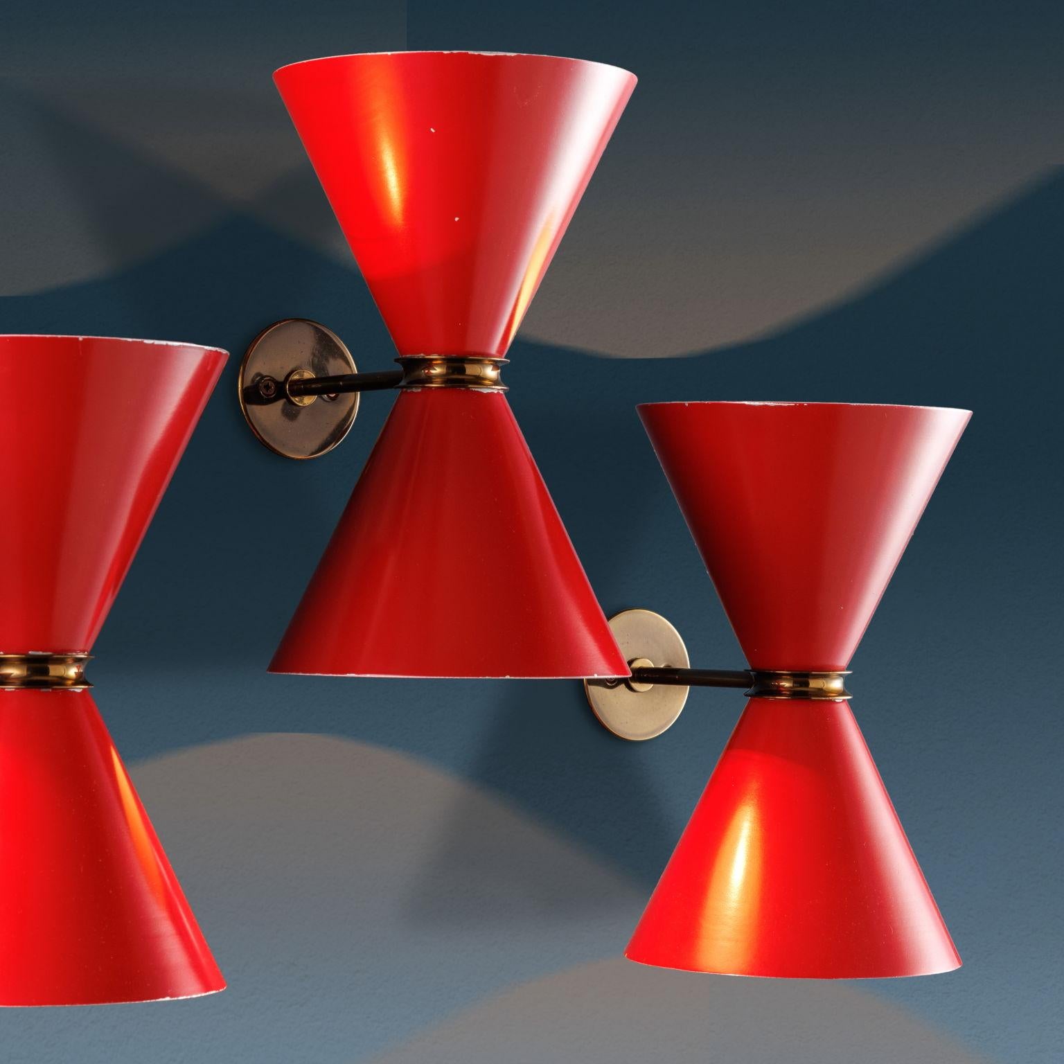 Italian Set of four 1960s wall sconces, red metal
