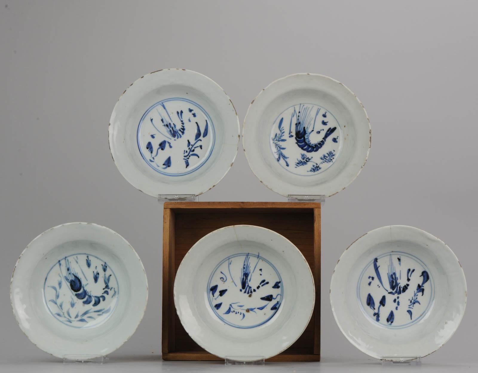 A Ming blue and white porcelain klapmuts/bowl, Transitional period, Tianqi or Chongzhen, circa 1625-1640. The steep sided but shallow Ko-Sometsuke porcelain bowl has a moulded border in the Kraak style and is decorated with a shrimp or prawn among