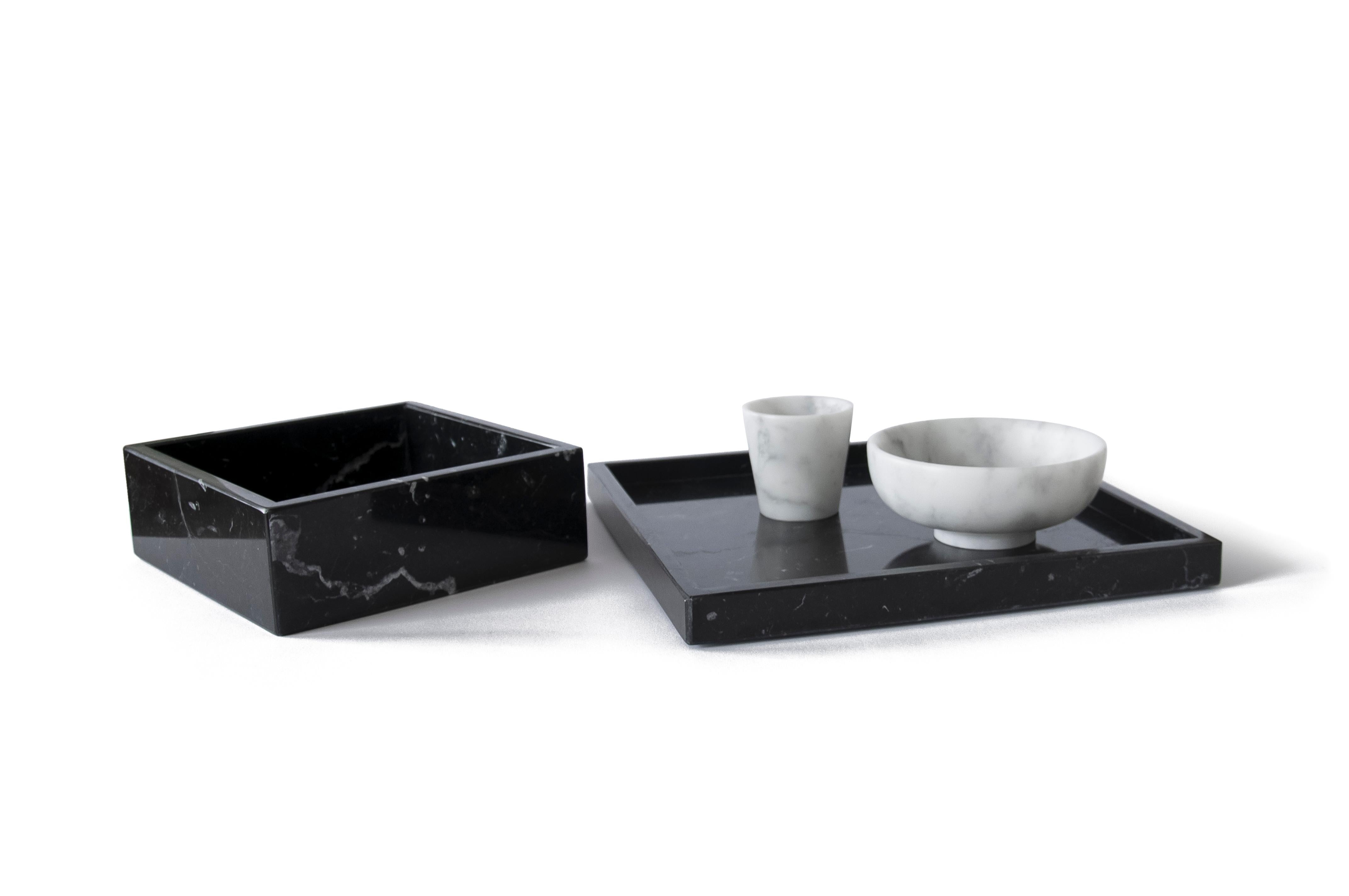 Set composed by one spa tray (26,5x26,5x2cm) and one towel tray (17,5x17x6cm) in black Marquina marble, one small bowl (12,5x5cm) and one small glass (6x6cm) in white Carrara satin marble.

Product weight (excluding shipping): gr 2200 (spa tray), gr