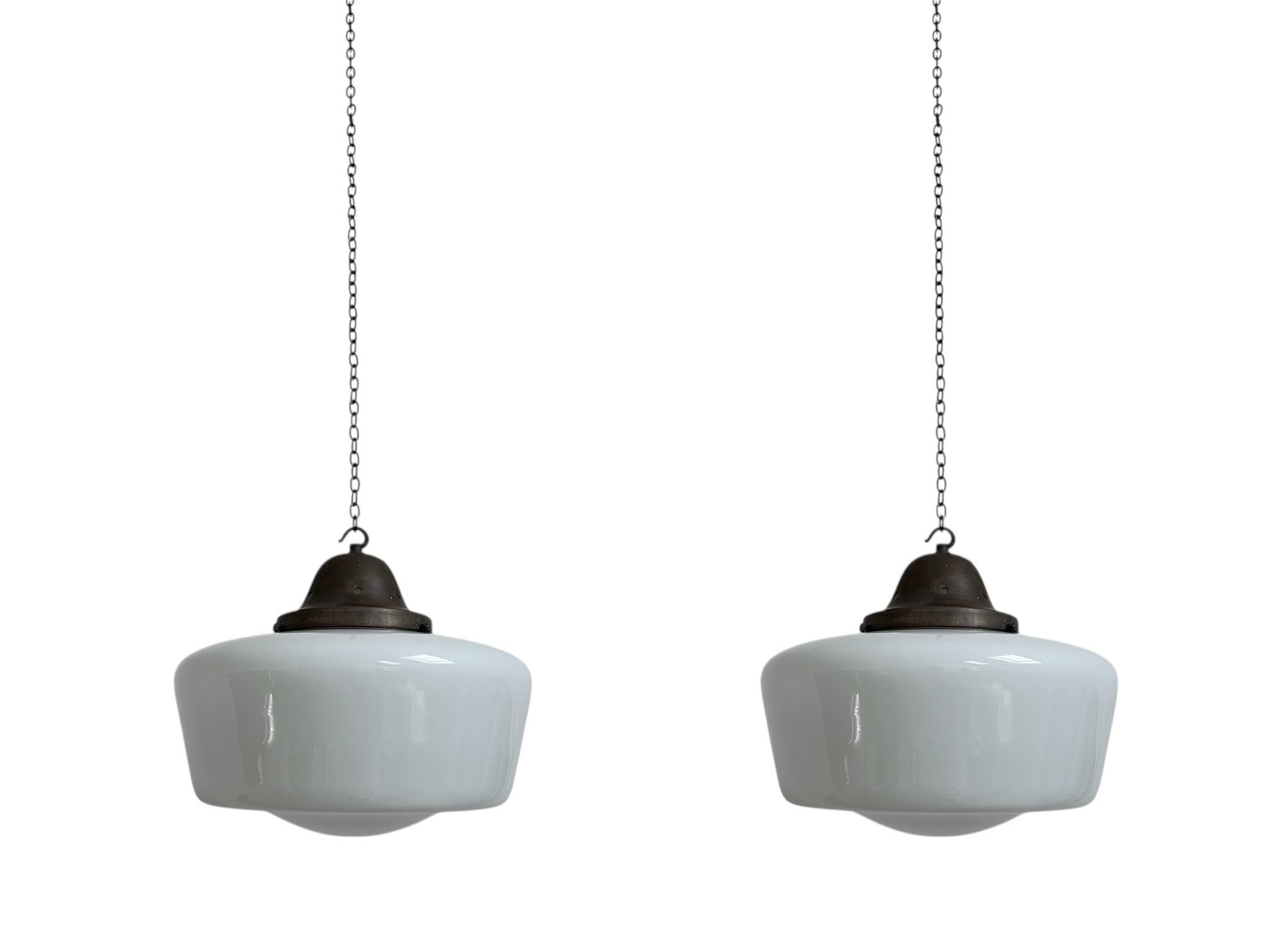 - A rare and impressive trio of church opaline 'Hailware' ceiling pendants by Hailwood & Ackroyd, England circa 1930.
- These milk glass ceiling pendants originally hung inside an old church in West Yorkshire England, and are in a wonderful