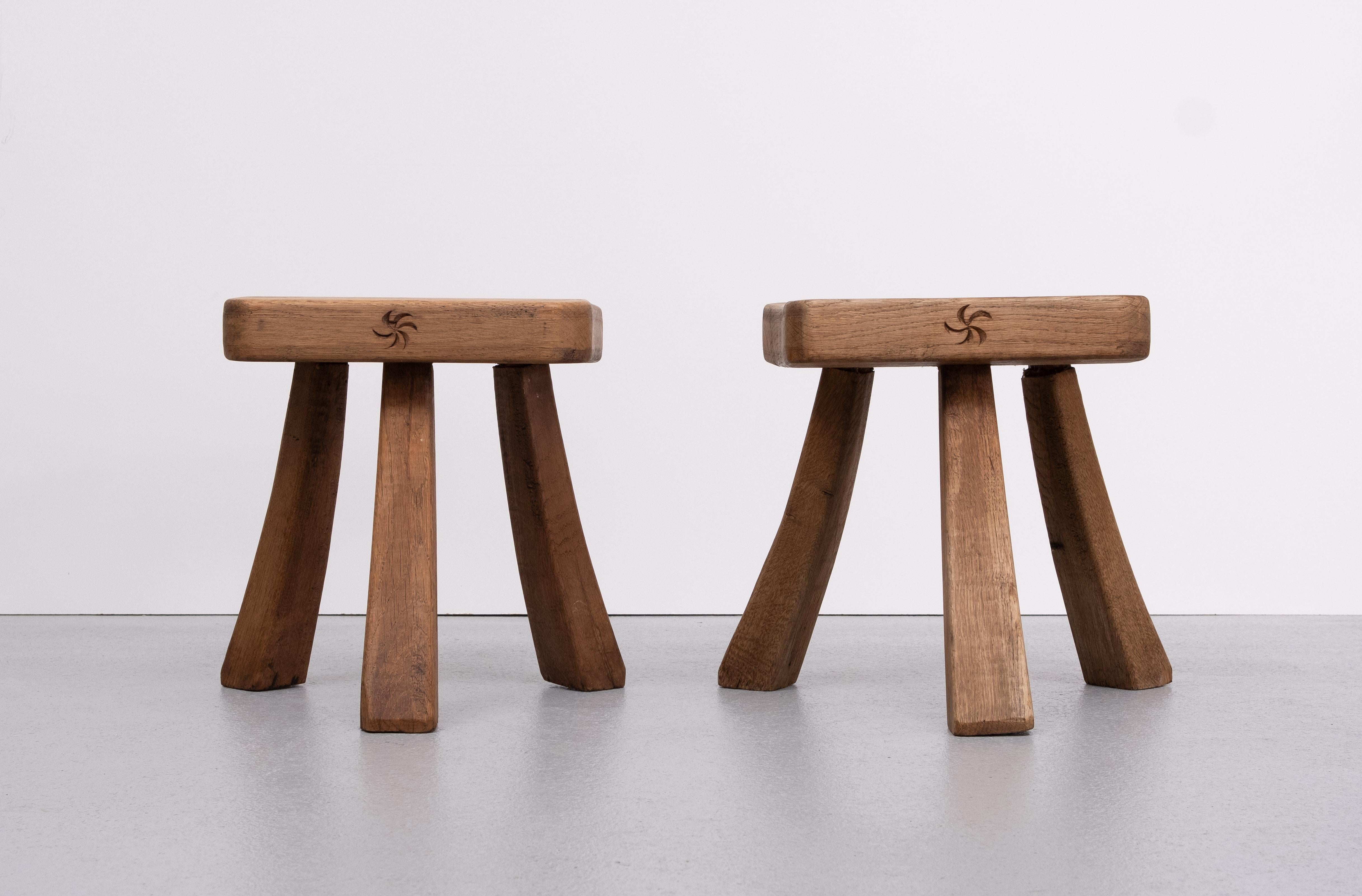 Set rustic Stools . Solid Oak wood . 1960s Holland 
Brutalist Three legged stools 