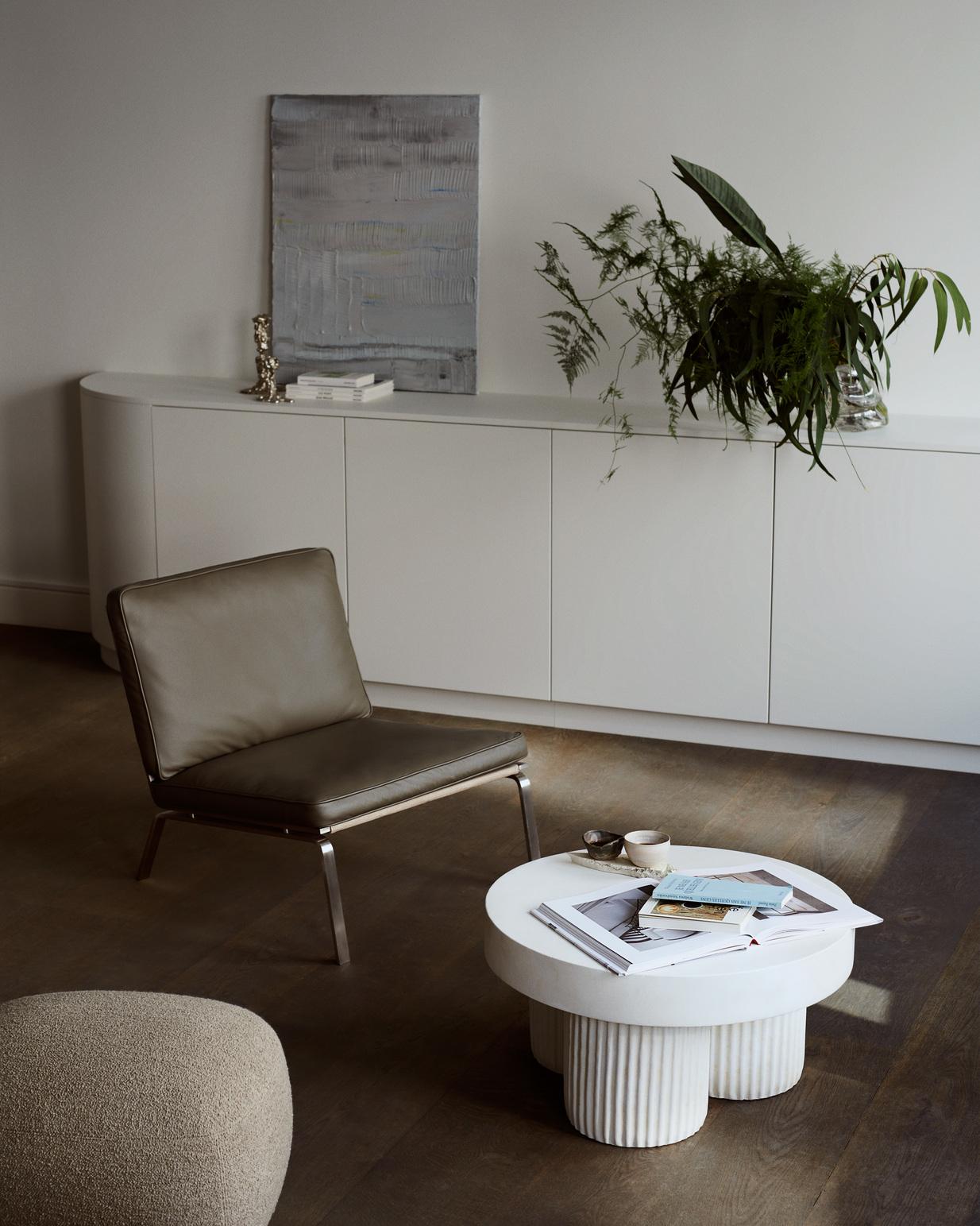 white sculptural side table