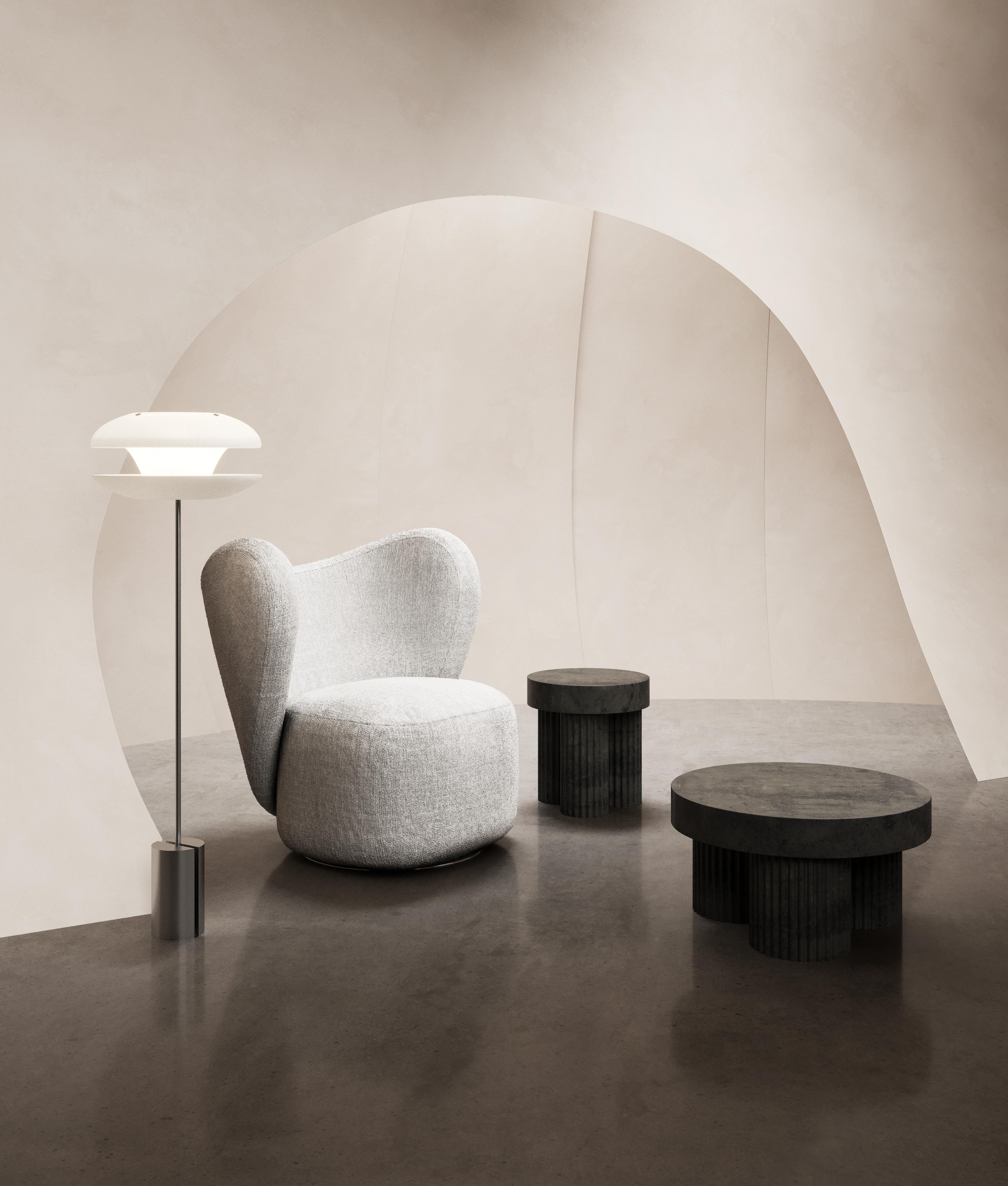 Gear is inspired by Brutalism Architecture from the mid-20th century. The sculptural coffee and side tables are designed as block-like structures, reflecting architectural building components of concrete. The Gear tables comes with a circular table