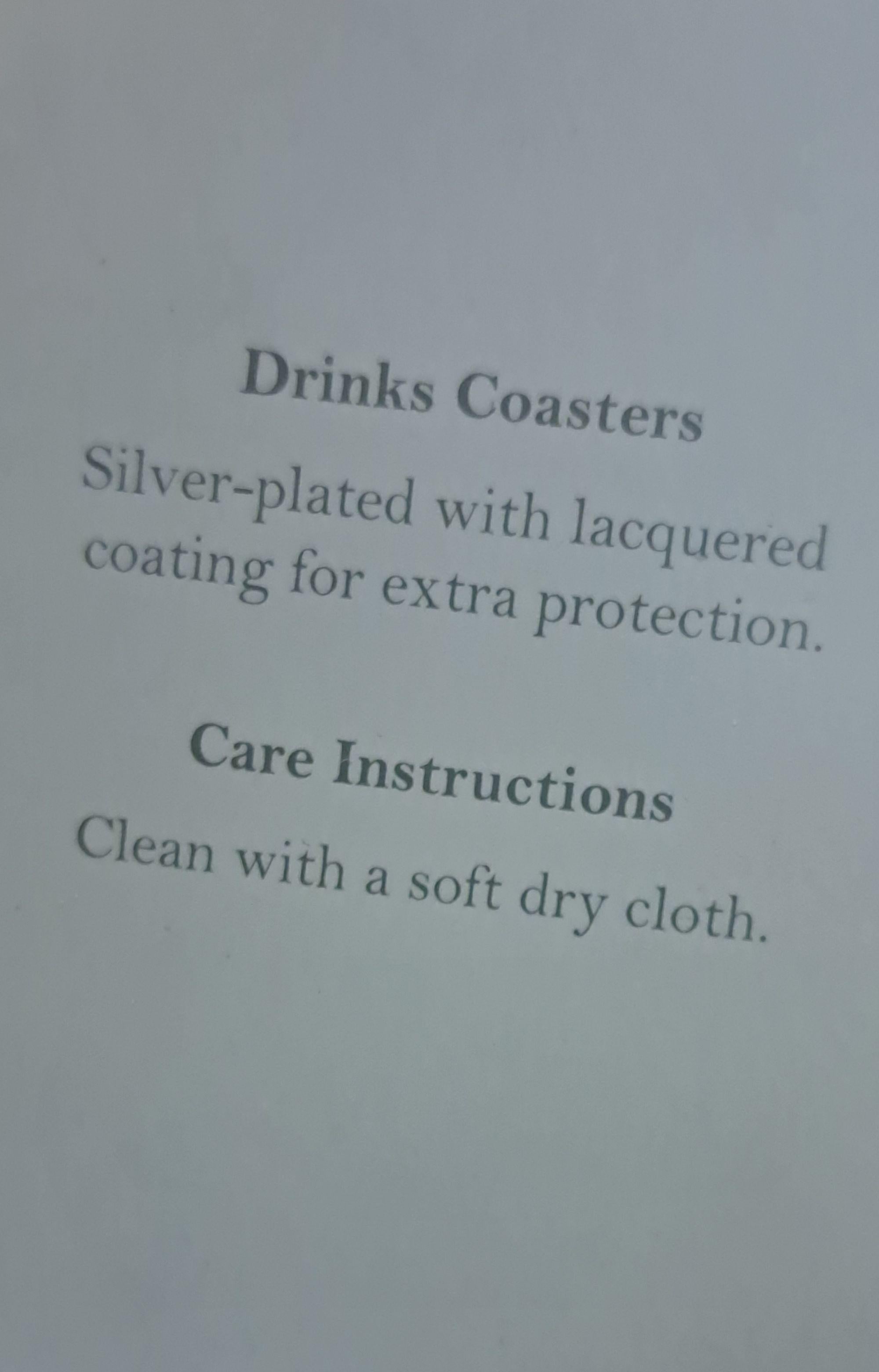 Juego de posavasos plateados Regalo de Navidad 2008 para el personal de la Casa Real en venta 1