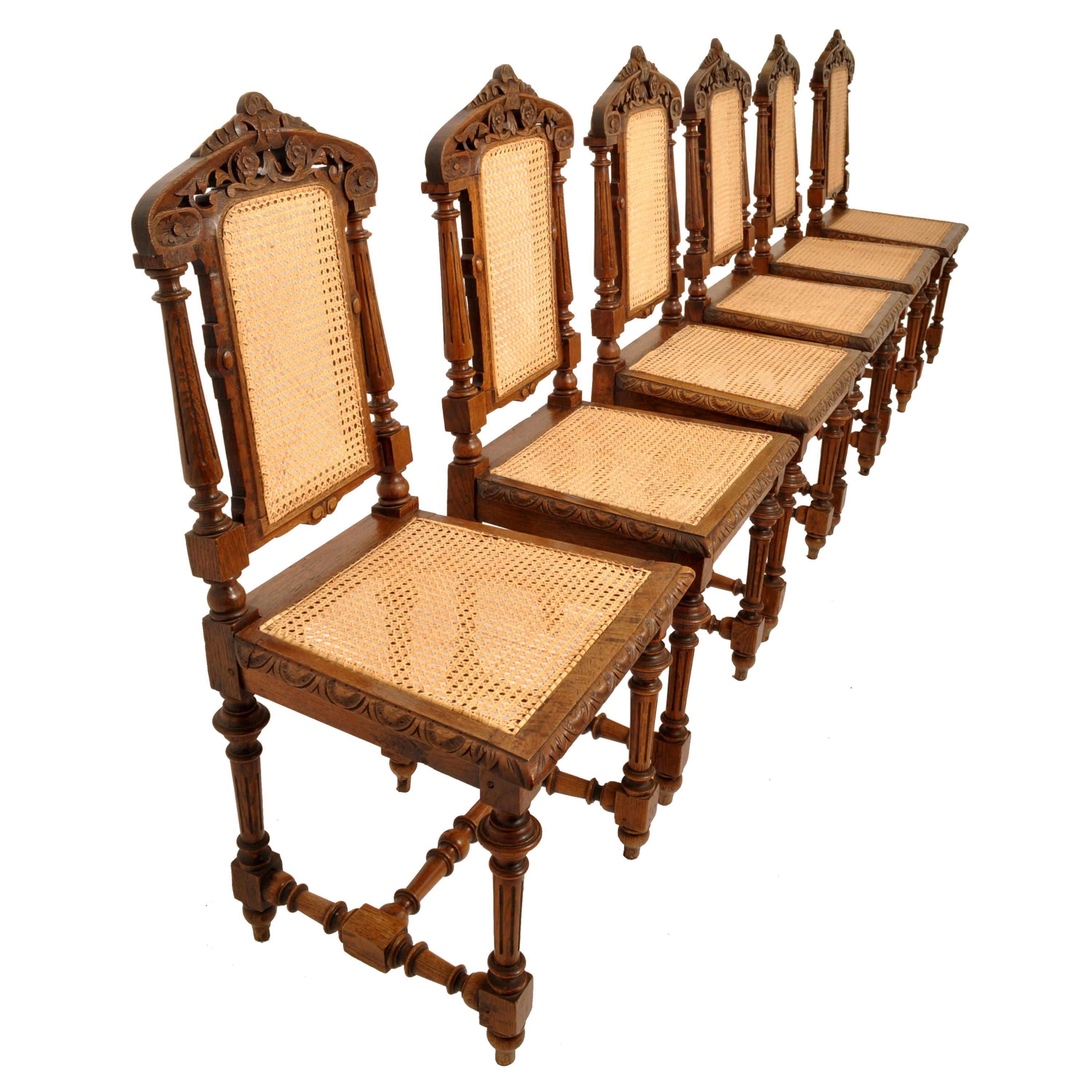 A very good set of antique French carved oak Henri II dining chairs, Circa 1880.
The chairs have just been completely & professionally re-caned by hand, each chair has also been completely re-glued and clamped in bloomsbury's workshops, the chairs