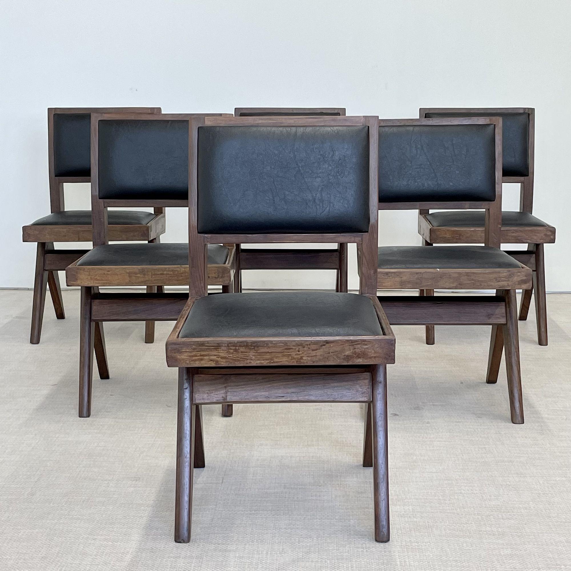 Pierre Jeanneret, French Mid-Century Modern, Six Dining Chairs, Teak, Chandigarh

Set of six Pierre Jeanneret armless upholstered dining chairs, Model PJ-SI-25-E. Rare set of six upholstered dining chairs having a compass type double side leg