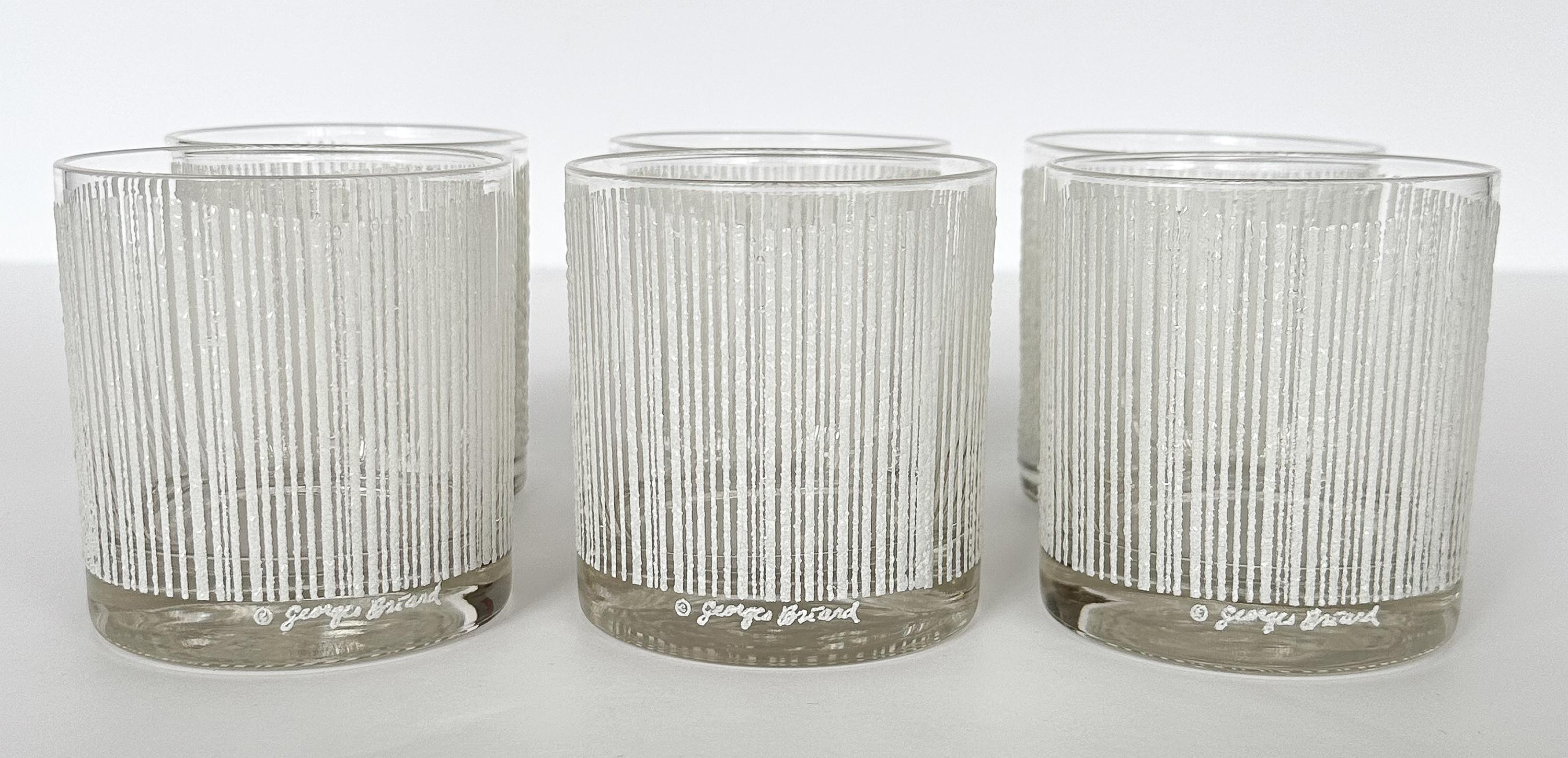 Discover the epitome of cocktail sophistication with this set of six mid-century modern Georges Briard “icicle” pattern rocks / old fashioned glasses in white. The 
