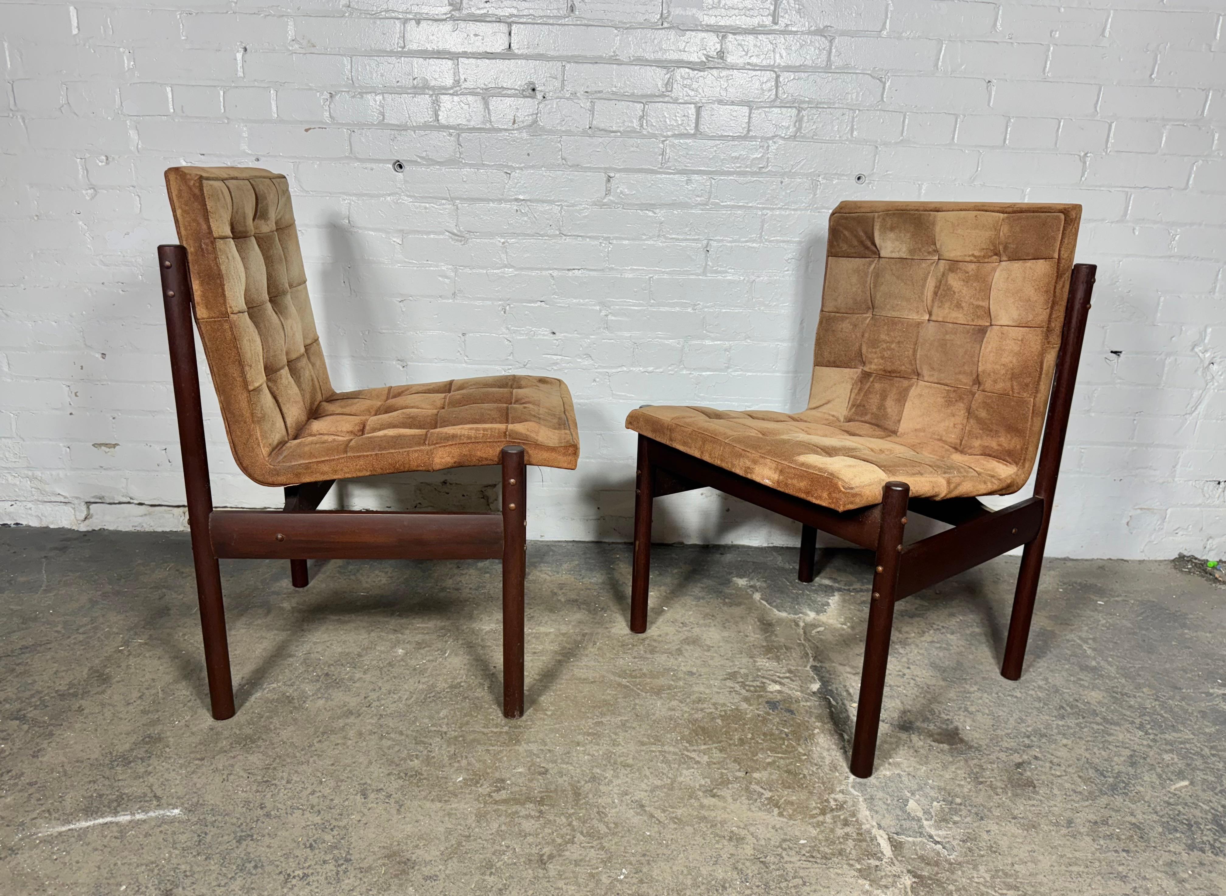 The Brazilian furniture designer Percival Lafer, Rosewood frame dining chairs featuring floating seats with well worn and distressed original suede upholstery , Also retain  original labels, 