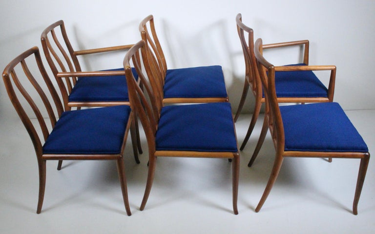 Set of Six T.H. Robsjohn-Gibbings for Widdicomb Furniture Company Solid Black Walnut Upholstered Dining Chairs. Featuring refinished curved contoured spindle type backs with flat front and rounded to rear, sturdy sabre front legs, strapped