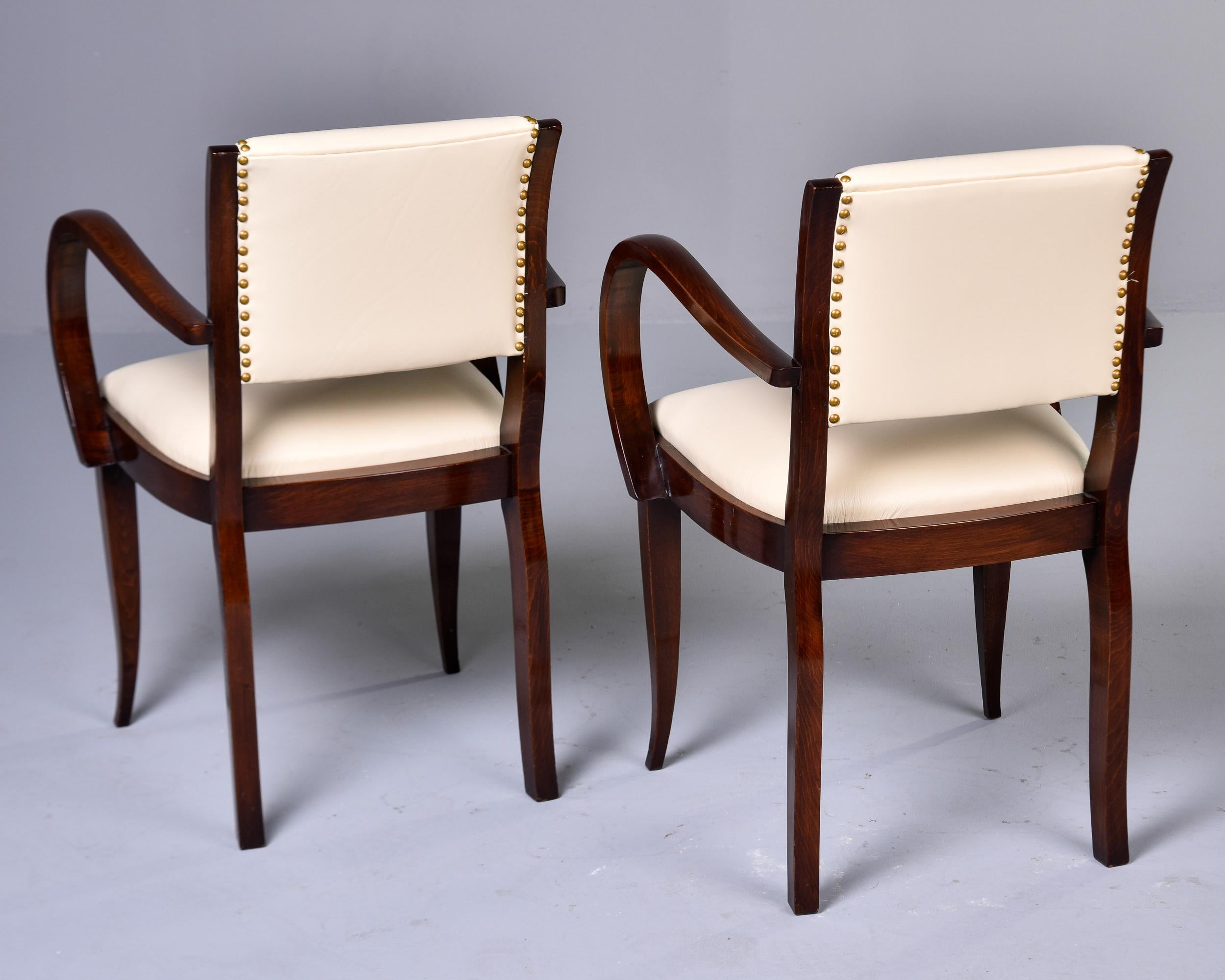 Brass Set Six Vintage French Curved Arm Walnut Chairs with New Leather Upholstery For Sale
