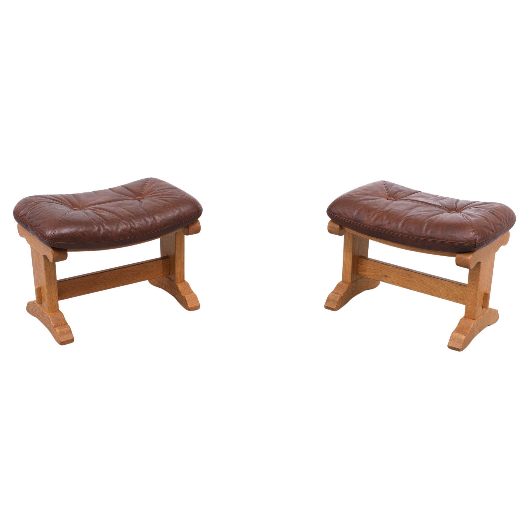 Two very nice foot stools, Made in solid oak, comes with a brown leather
upholstery. Manufactured and signed Meubelfabriek Oisterwijk Holland, 1970s.
There slogan was. Made to last forever. Indestructible. Good condition.