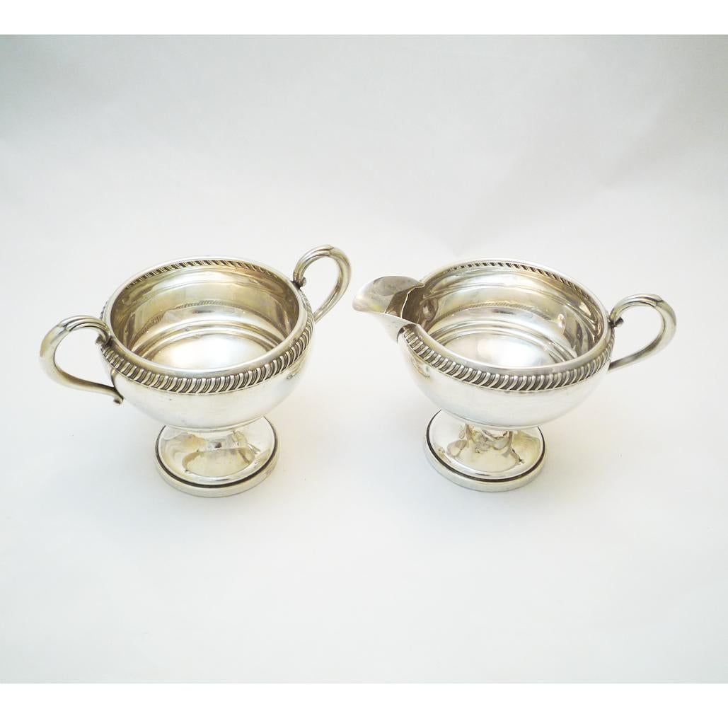 Set of a sugar bowl and cream jug silver, Sterling weighted.
There is a slight damage at the foot of the cream jug, but stands stabile and vertical
Scandinavia, circa 1930.