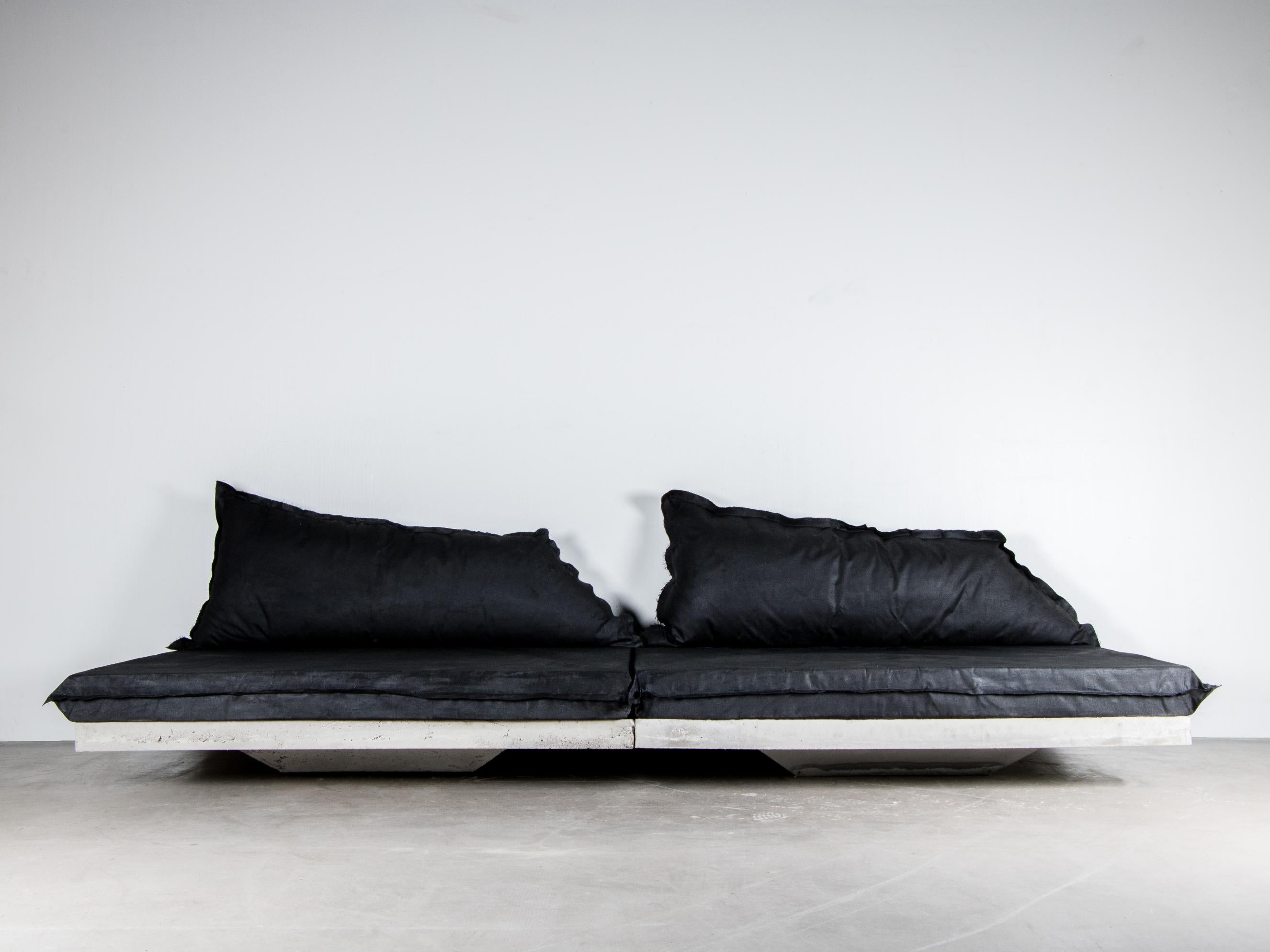 SVÄV sofa by Lucas Morten
2021
Limited edition of 19
Price per 2 modules
Module dimensions: H 32, D 110, W 140 cm
Module weight: 100 kg.
Material: concrete and hand-waxed upholstered cushion.


A floating concrete raft - an illusion or an