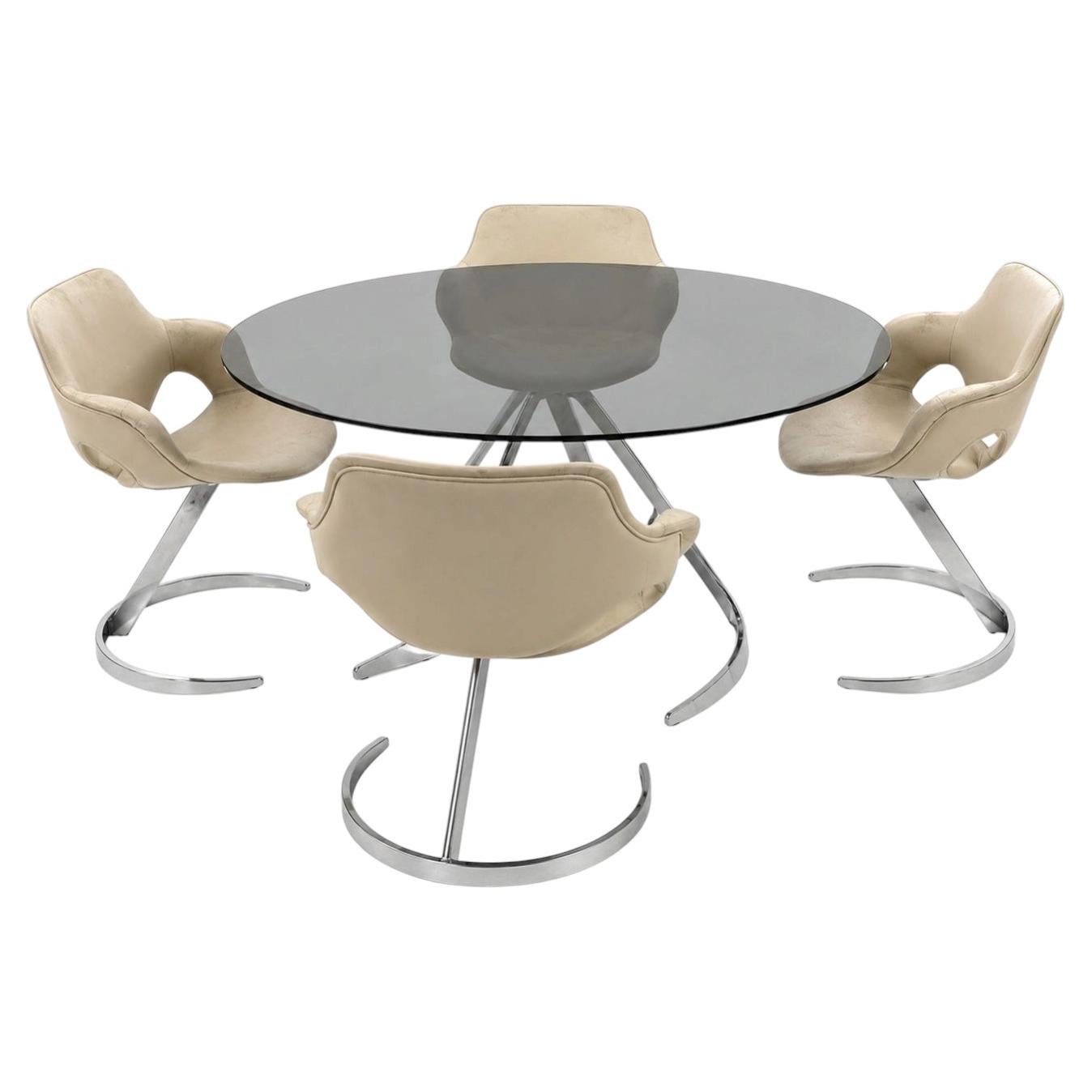 Ensemble composé d'une table et de 4 chaises, Boris Tabacoff, 1960 en vente
