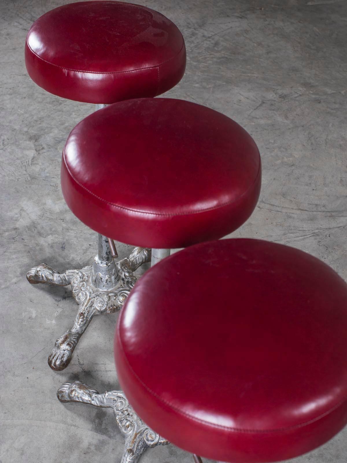 Leather Set of Three Vintage English Cast Iron Counter Stools, England, circa 1895 For Sale