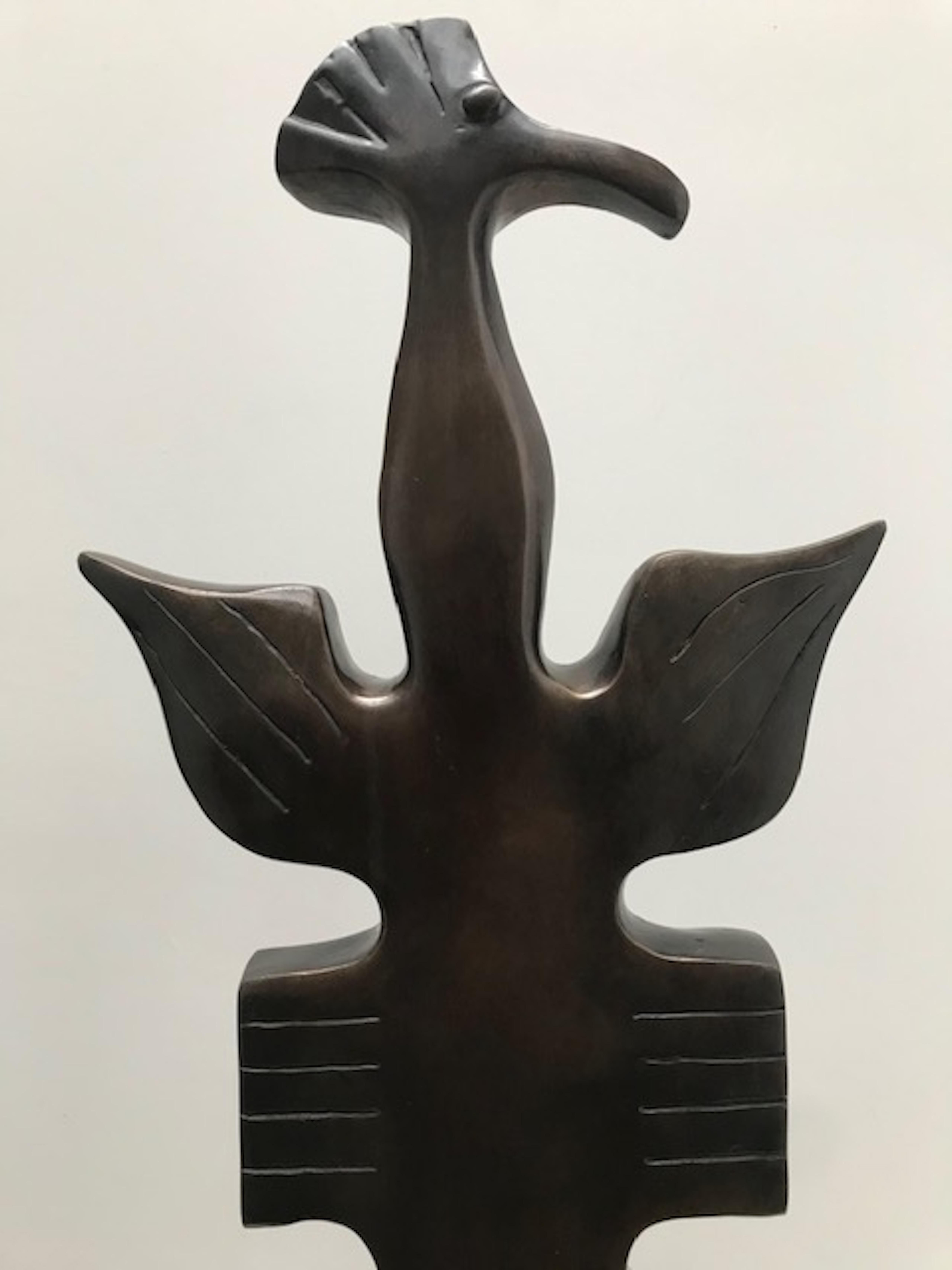 One of a kind beautiful pair of  'Totem Birds' bronze sculptures, hand crafted and cast in the lost wax process. Inspired by tribal Art,  and more specifically,  Aztec totem poles,  'Totem Birds' figures reflect the regality of the ancient Aztec