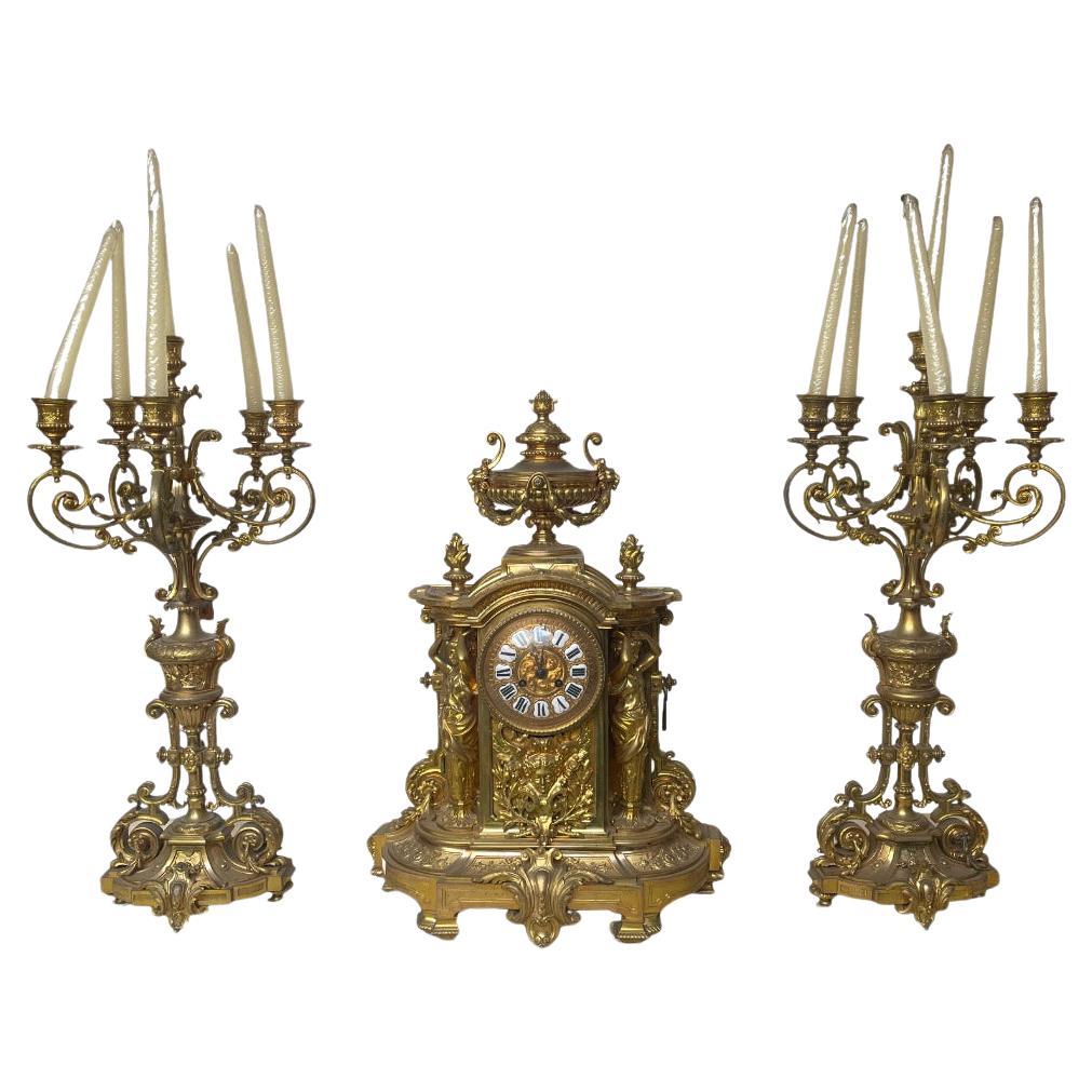 Maestozo Trix di Orologio con candelabri in bronzo 800 en vente