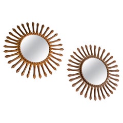 Ensemble de deux miroirs muraux Sunburst avec finition en laiton doré, signés Chaty Vallauris, 1960