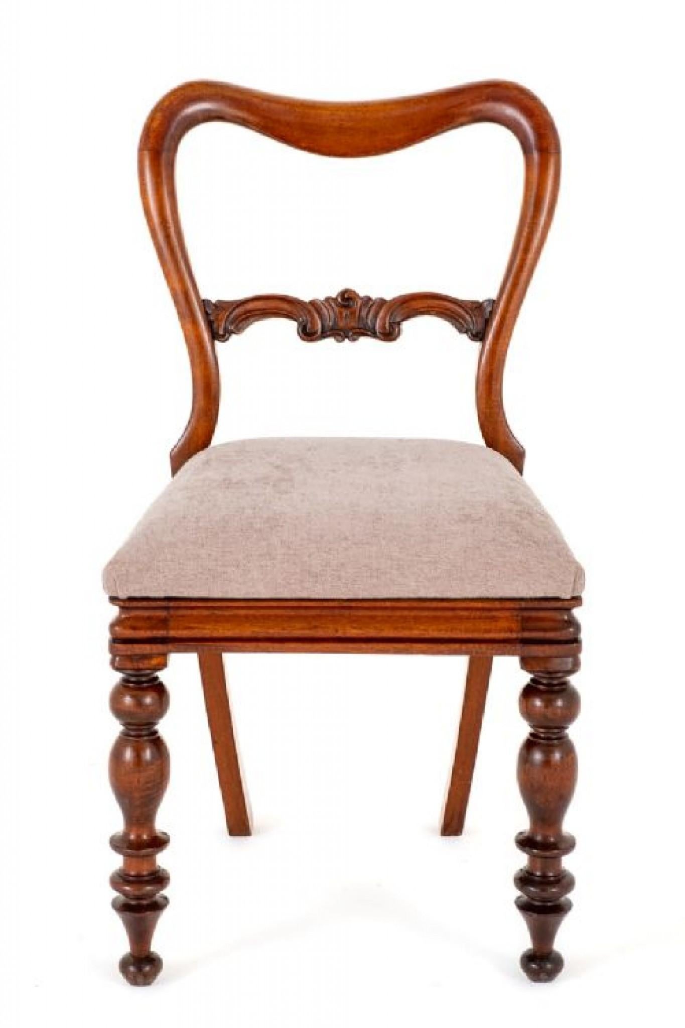 Set of 6 Victorian Mahogany Dining Chairs.
Circa 1850
These chairs Have Turned Front Legs and Sabre back Legs.
The Chairs Feature Recently Re Upholstered Lift Out Seats.
Having a Shaped Back, Shaped Cresting Rails and a Carved Centre Rail.
Presented