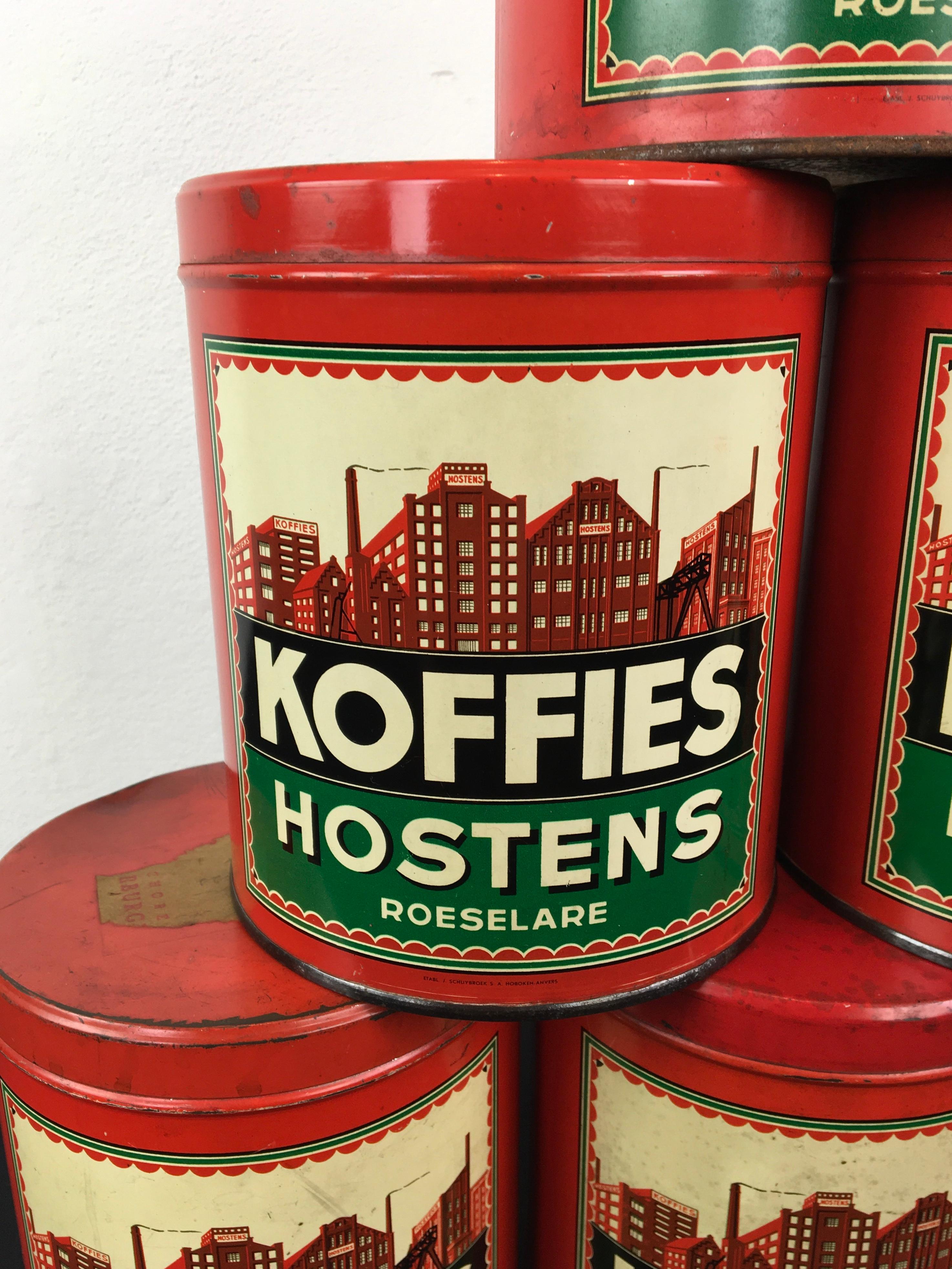 Set of 6 vintage coffee tins with their factory on. 
Red with green round coffee tins with the factory or coffee roasting factory on. 
They are double sided, so at the back you also have the design of the company.  All these round coffee tins have a