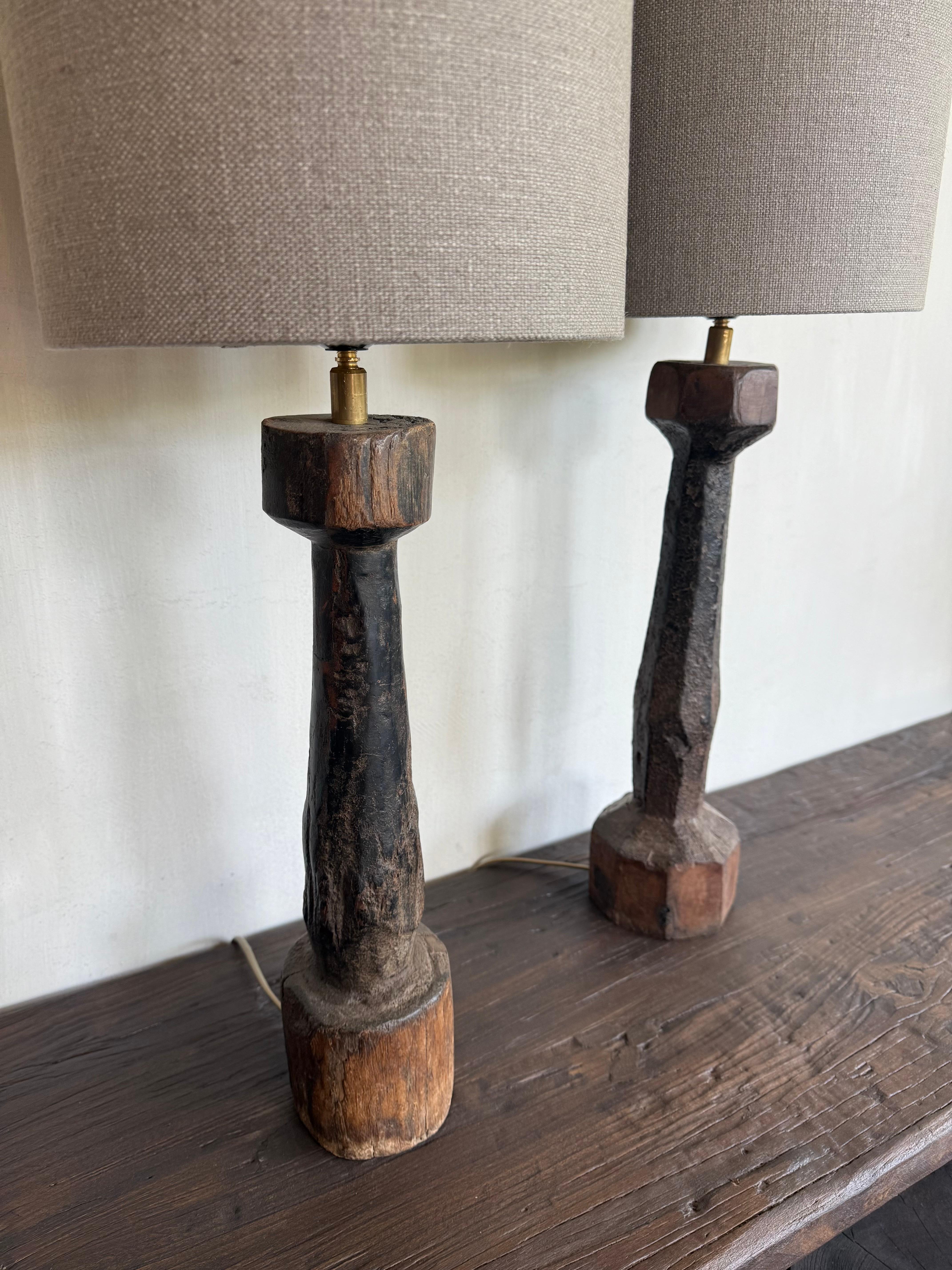 Set of lamps, composed of old French alpine supports and Belgian new linen lampshades.
The inside of the shades is in a gold finish for a pleasant warm light experience.
The wiring is in matt gold wire and Belgian European plug and switch. Can