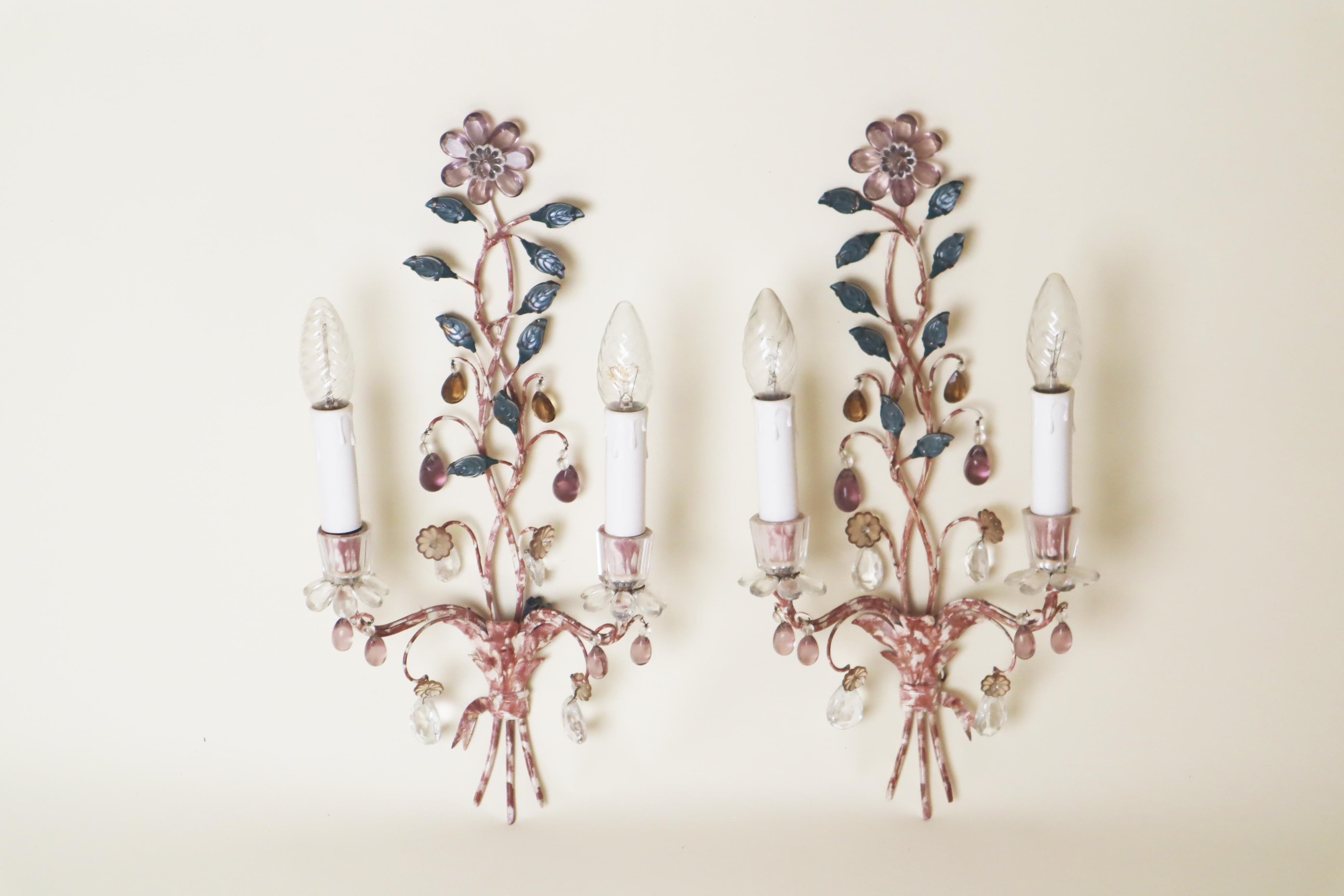 This pair of wall lights is truly one-of-a-kind. Its beauty and elegant, delicate craftsmanship are simply unmatched. Take a moment to admire these two beauties and be enchanted. The metal was lovingly hand-painted by an artist with masterful skill