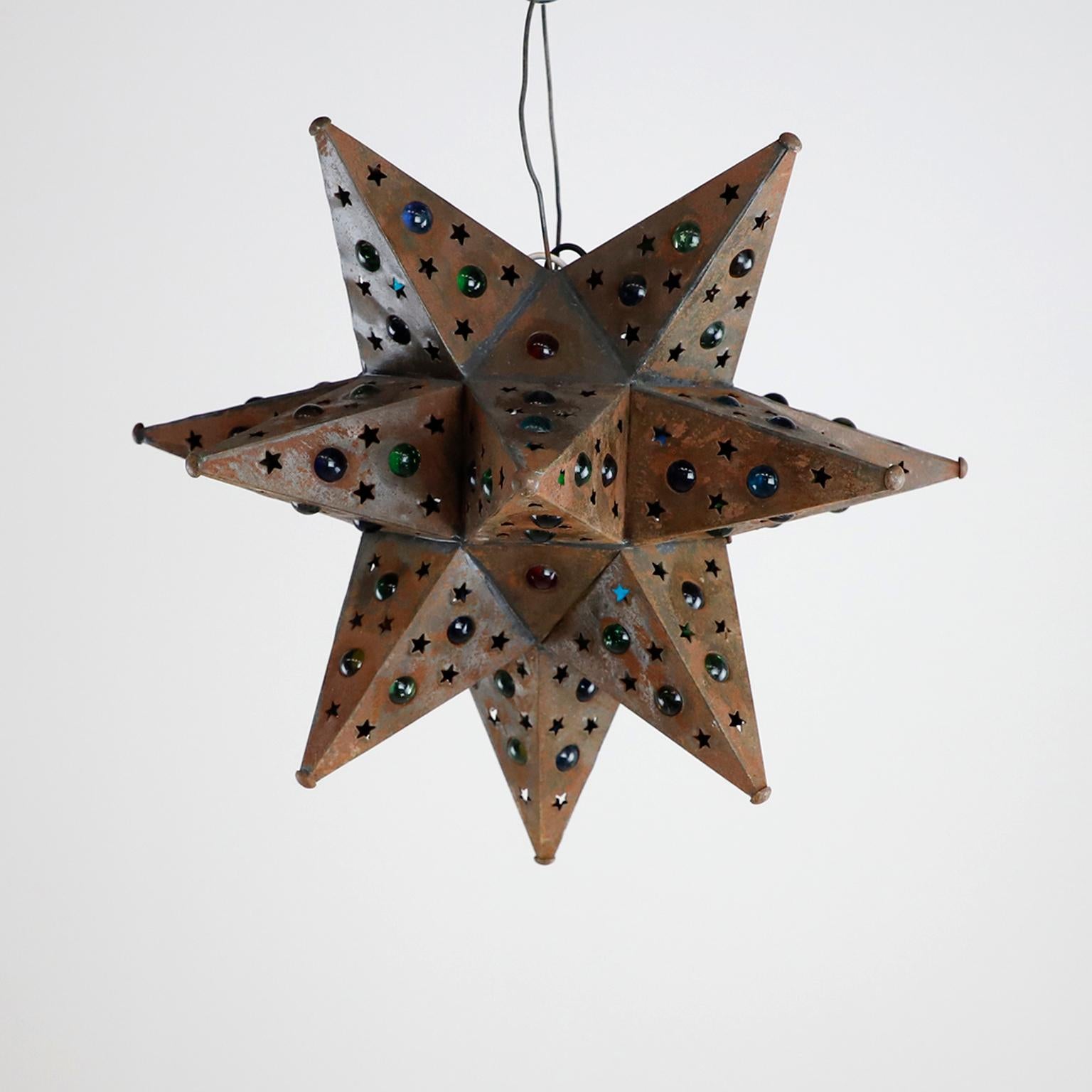 Circa 1960, We offer this fantastic seth of three Mexican pendant lamps in star shape.