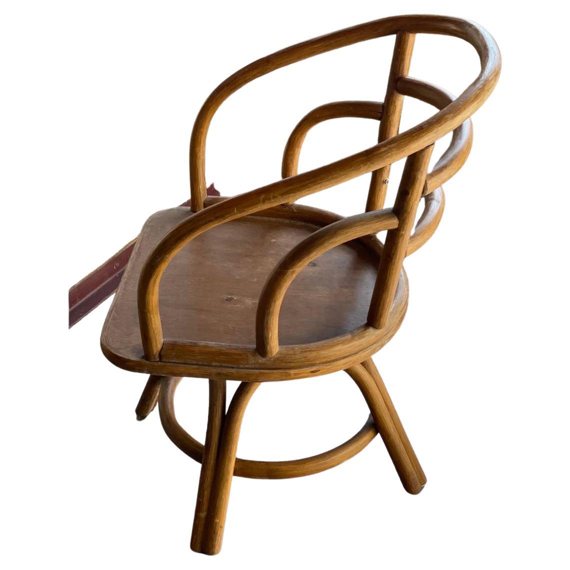Set of 4 Solid Bamboo French Bistro inspired swivel dining Chairs. Great Parisian flair, the curved backs and rounded seat gives these unique chairs a great style to use as side chairs, game table chairs, as well as table chairs.