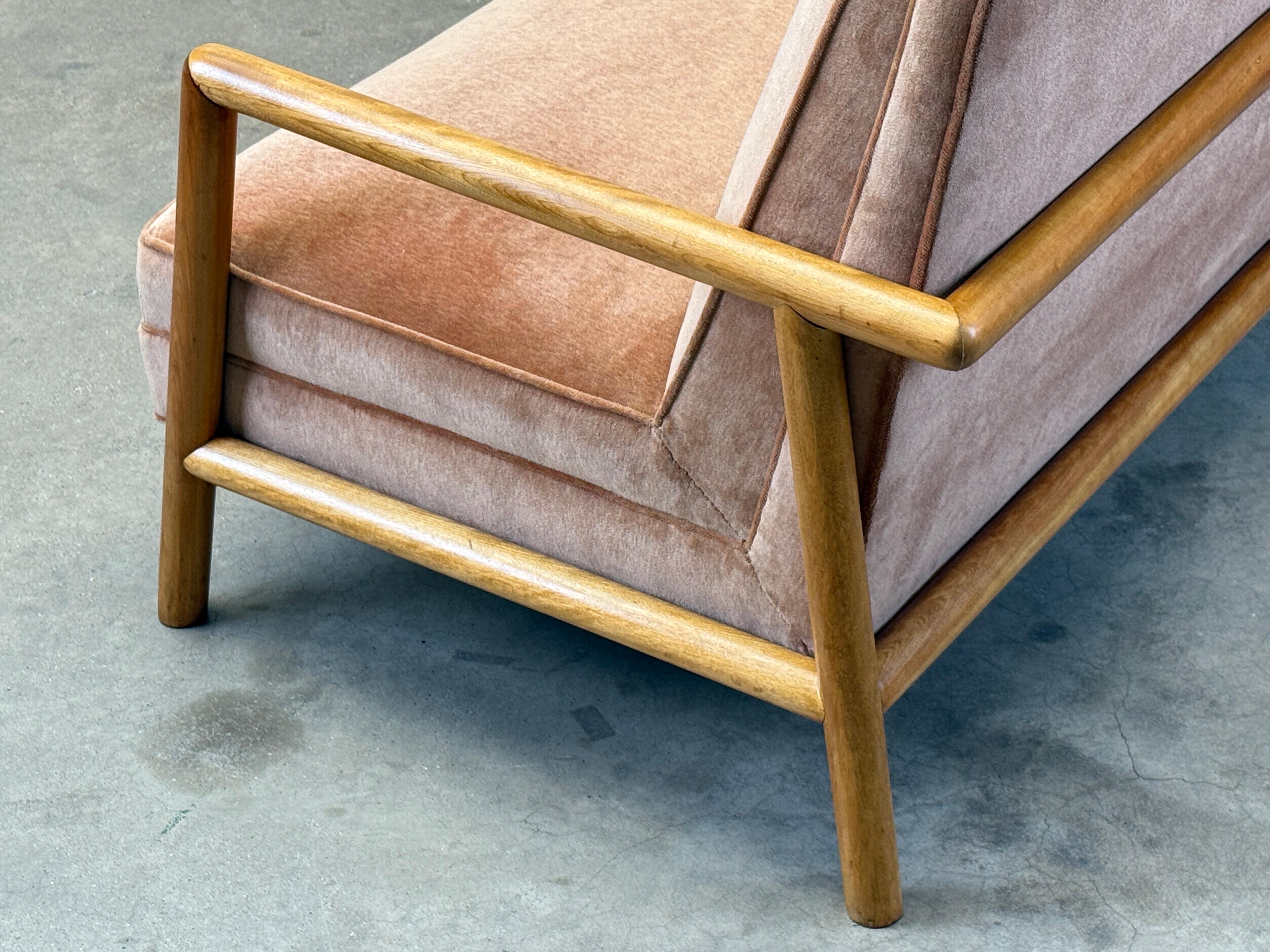 A maple framed settee designed by T.H. Robsjohn-Gibbings for Widdicomb. Fully restored. 