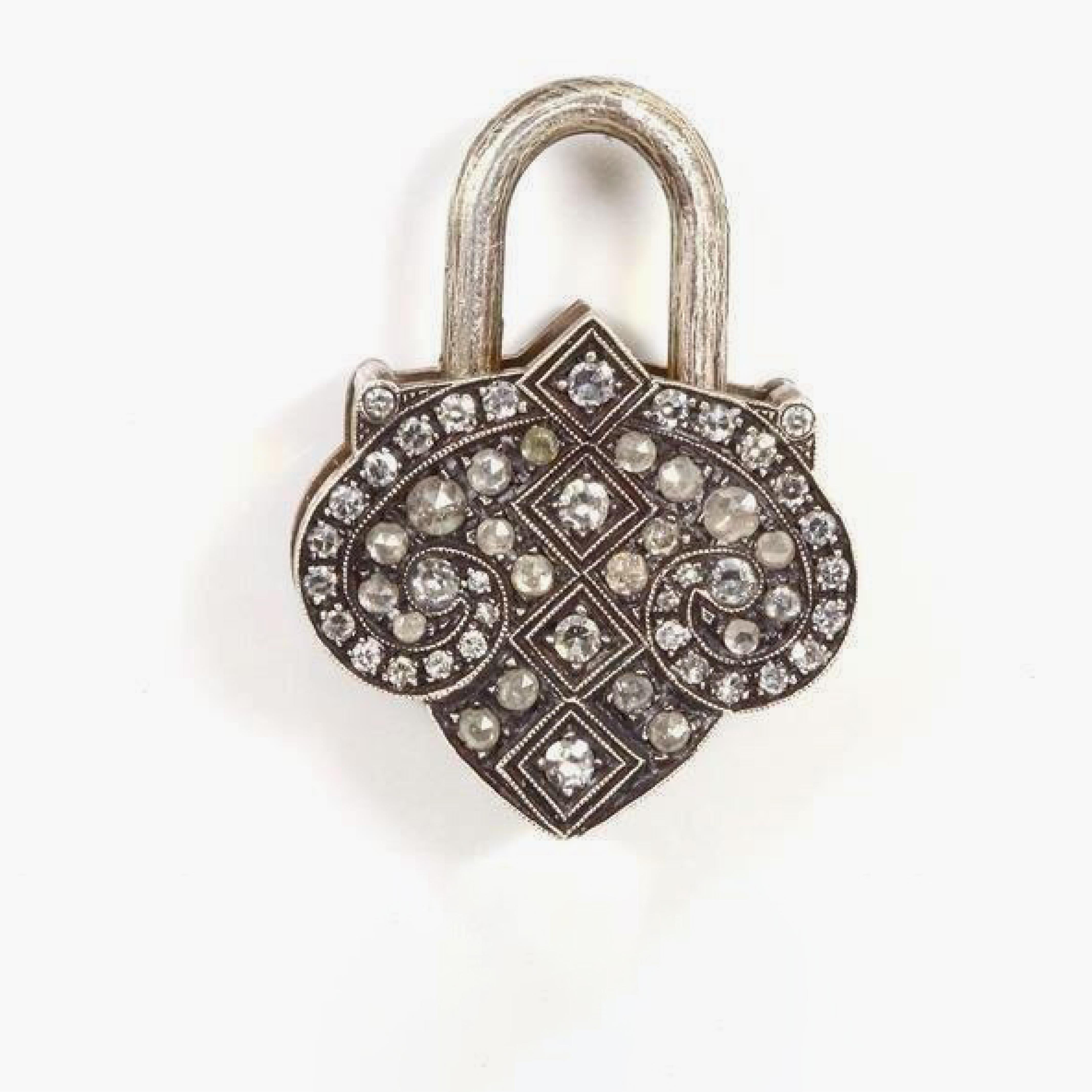 From the astounding work of Sevan Biçakçi, inspired
by the rich culture rooted in his homeland of Istanbul,
this collection represents the layered and beautiful
history of our past.
This pendant features a classic medieval lantern
padlock with