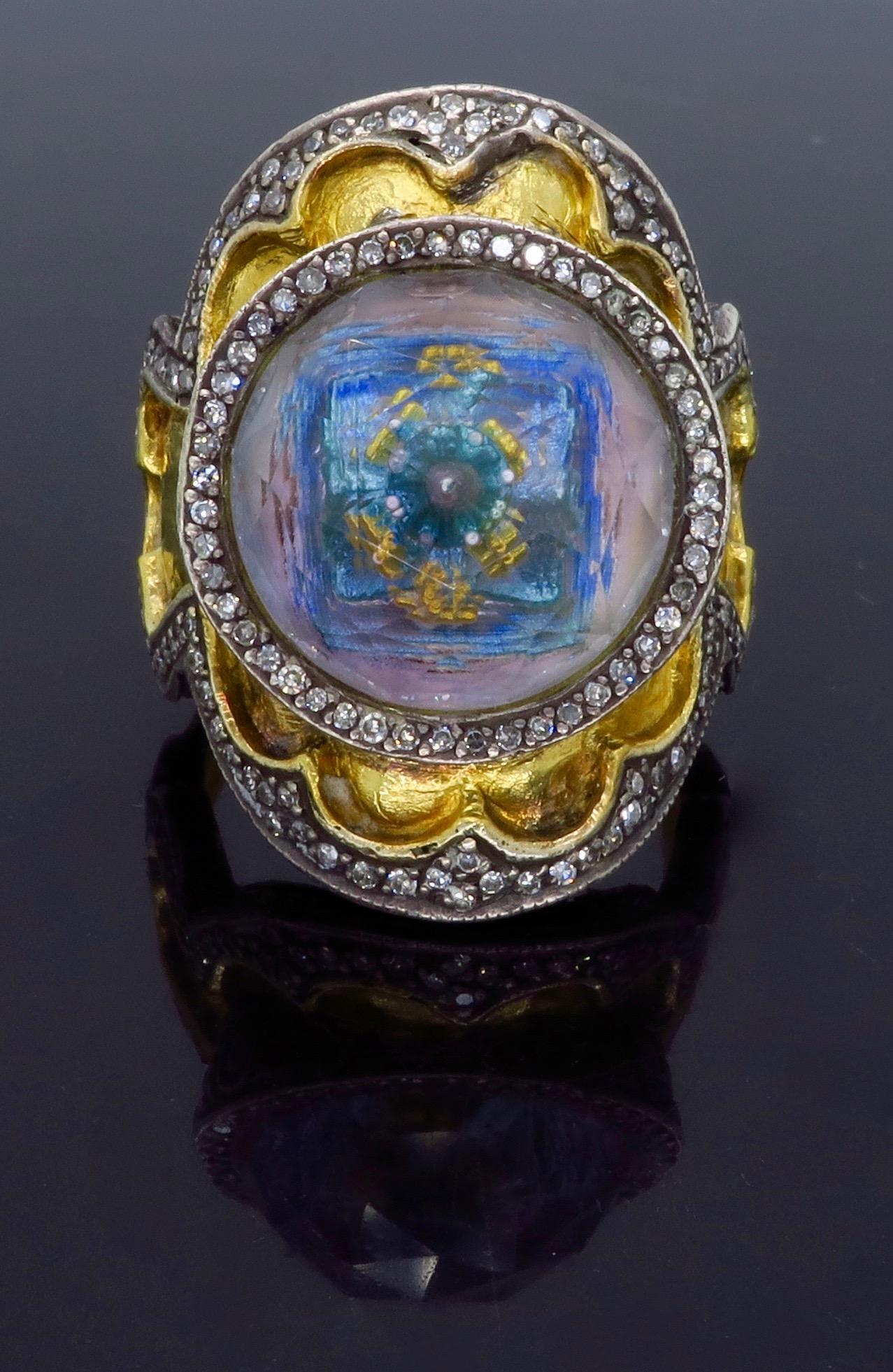 Hand crafted by the exclusive designer Sevan Biçakçi from his Theodora collection. All of Sevan's rings are one of a kind. The ring is 24K yellow gold with sterling silver accents. It features a large reverse cut amethyst that contains a beautiful
