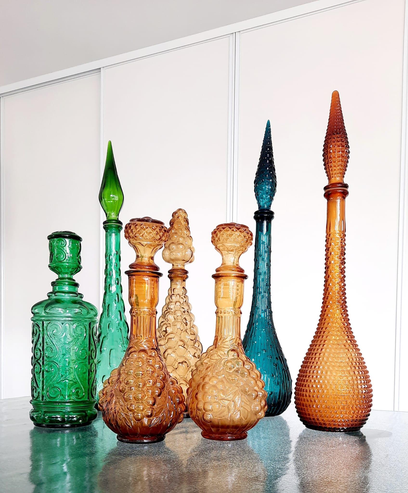 Seven 1960s Italian Empoli Rossini Glass Decanters For Sale 3