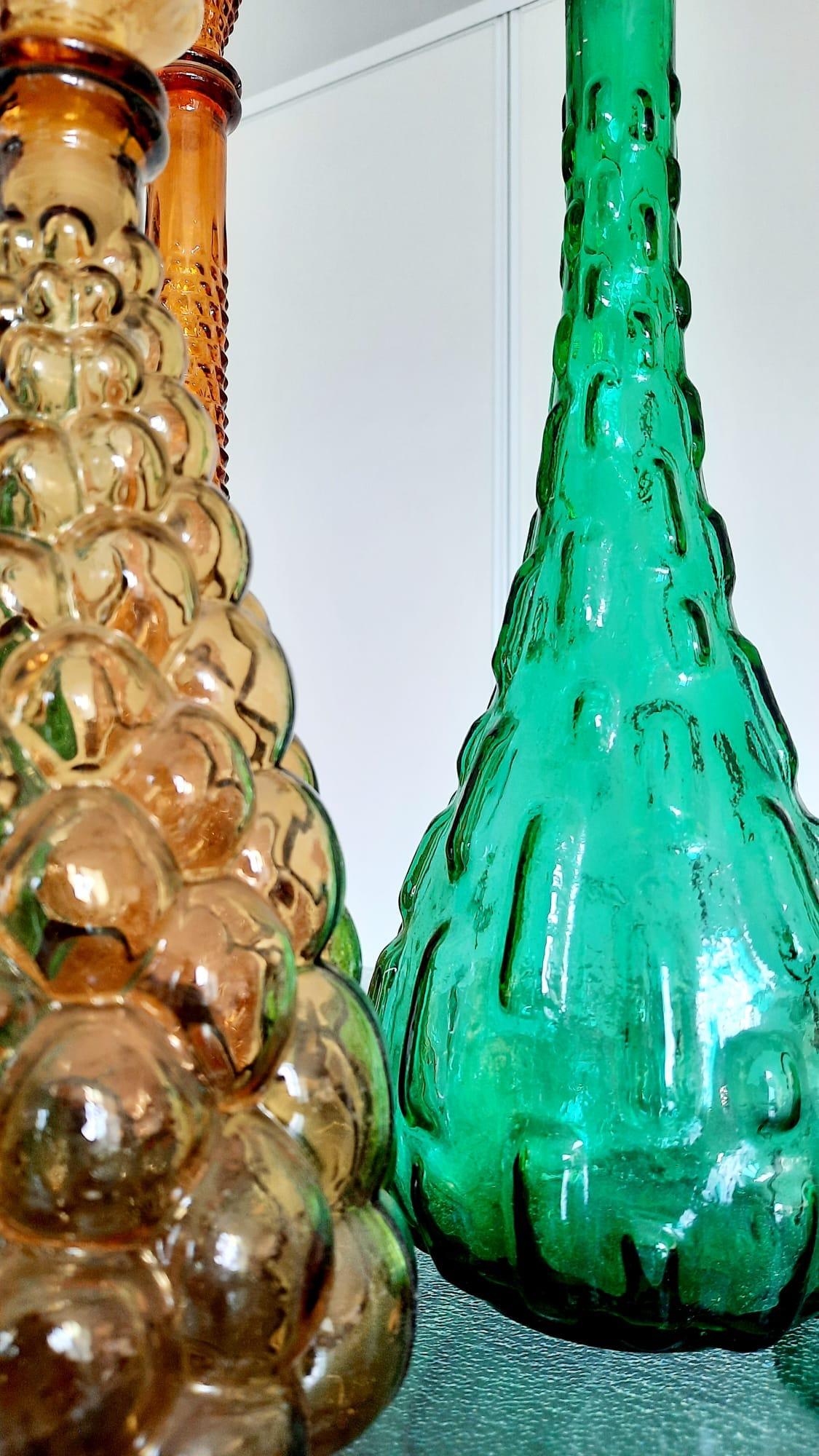 Seven 1960s Italian Empoli Rossini Glass Decanters For Sale 1