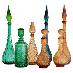 Seven 1960s Italian Empoli Rossini Glass Decanters