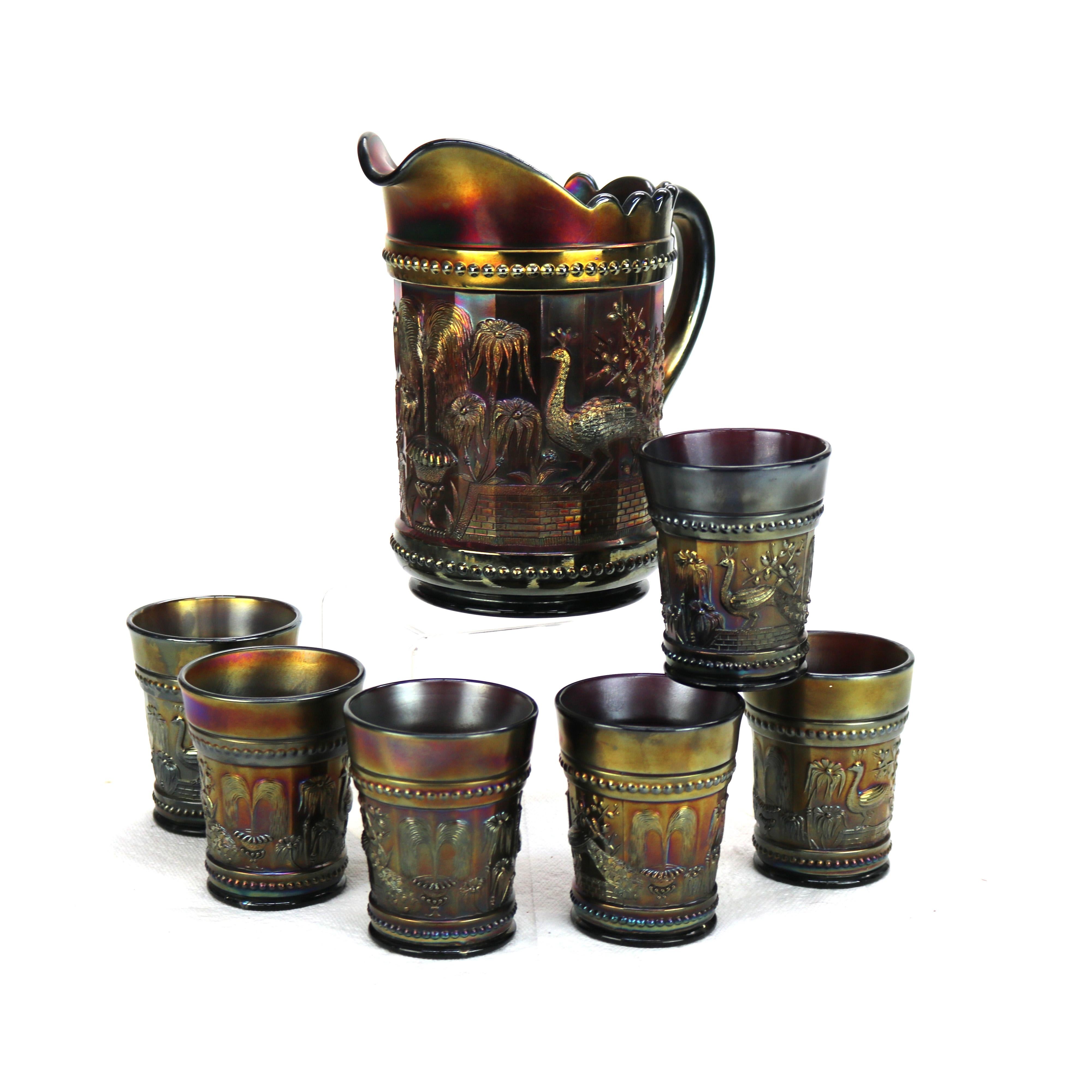 Seven Piece Antique Northwood Carnival Glass “Peacocks At The Fountain” Set - Pitcher & Tumblers Signed C1930

A stunning 7-piece set of Northwood Carnival Glass featuring the 'Peacocks At The Fountain' design. This set includes a beautifully