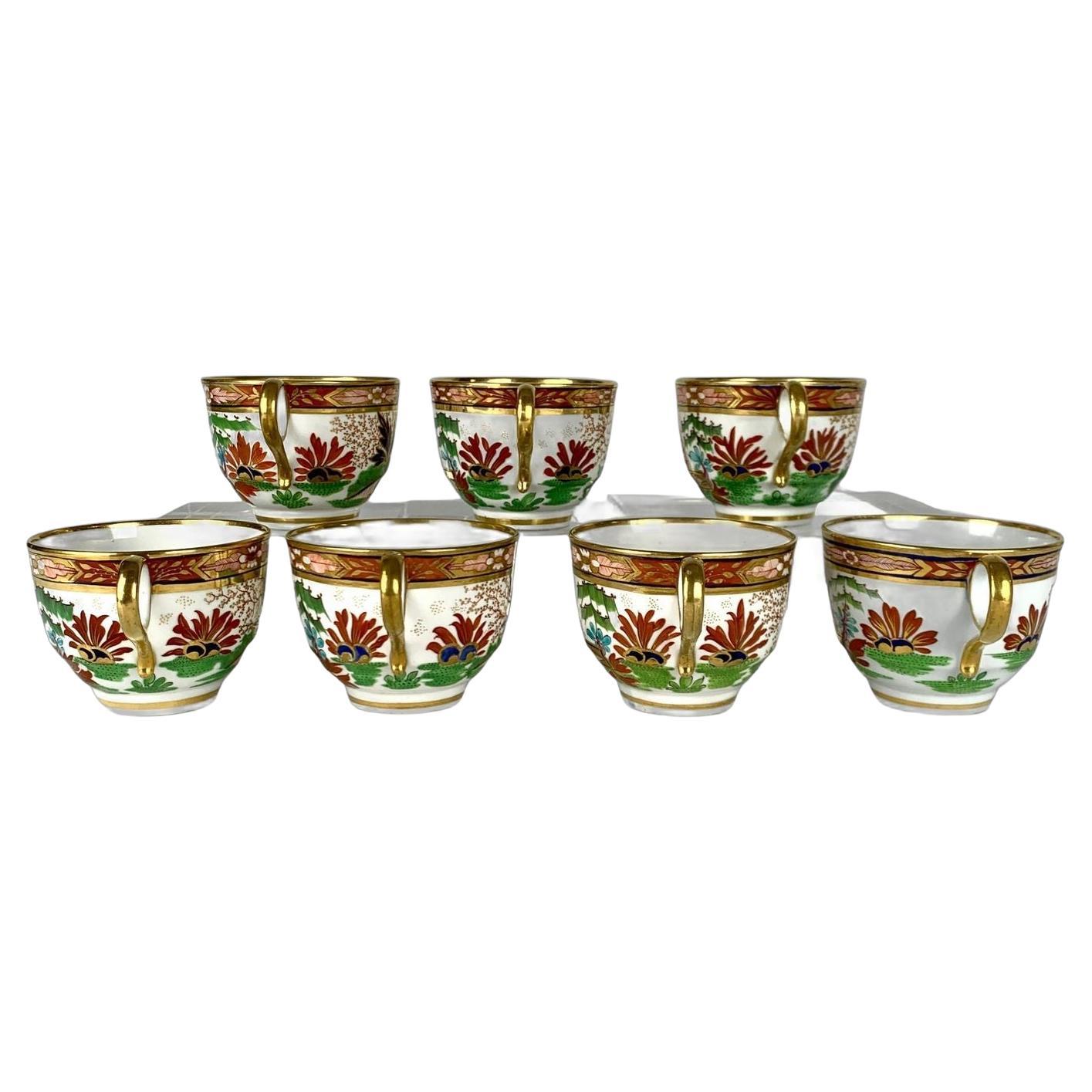 Seven Antique Worcester Cups Hand Painted in the Fence Pattern England Ca. 1810 For Sale