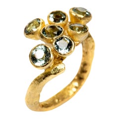 Seven Aquamarine 18 Karat Gold Ring Handmade by Disa Allsopp