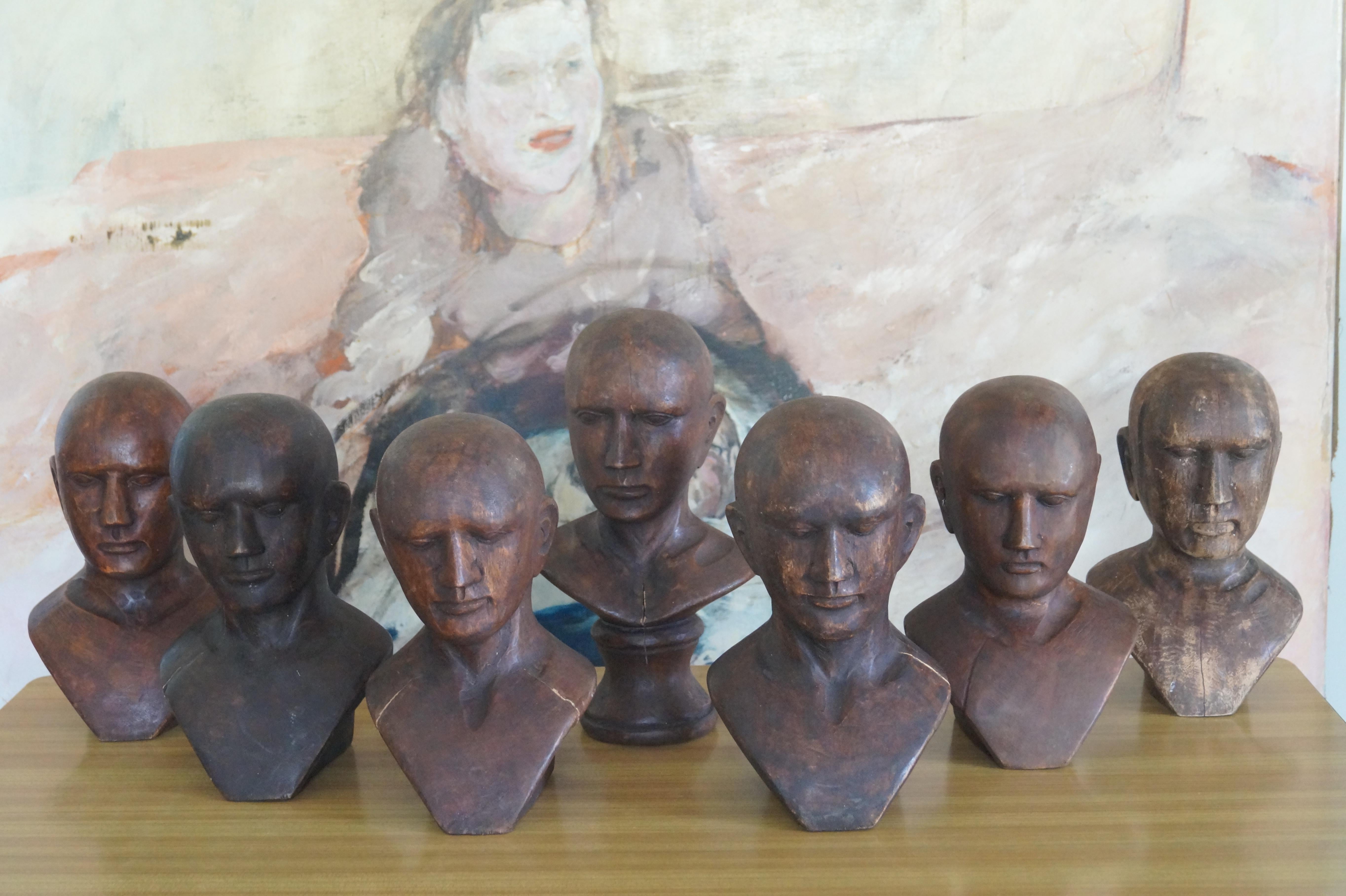 Seven Art Deco Oak Display Heads. France, 1930s 2