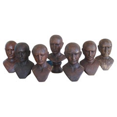 Seven Art Deco Oak Display Heads. France, 1930s