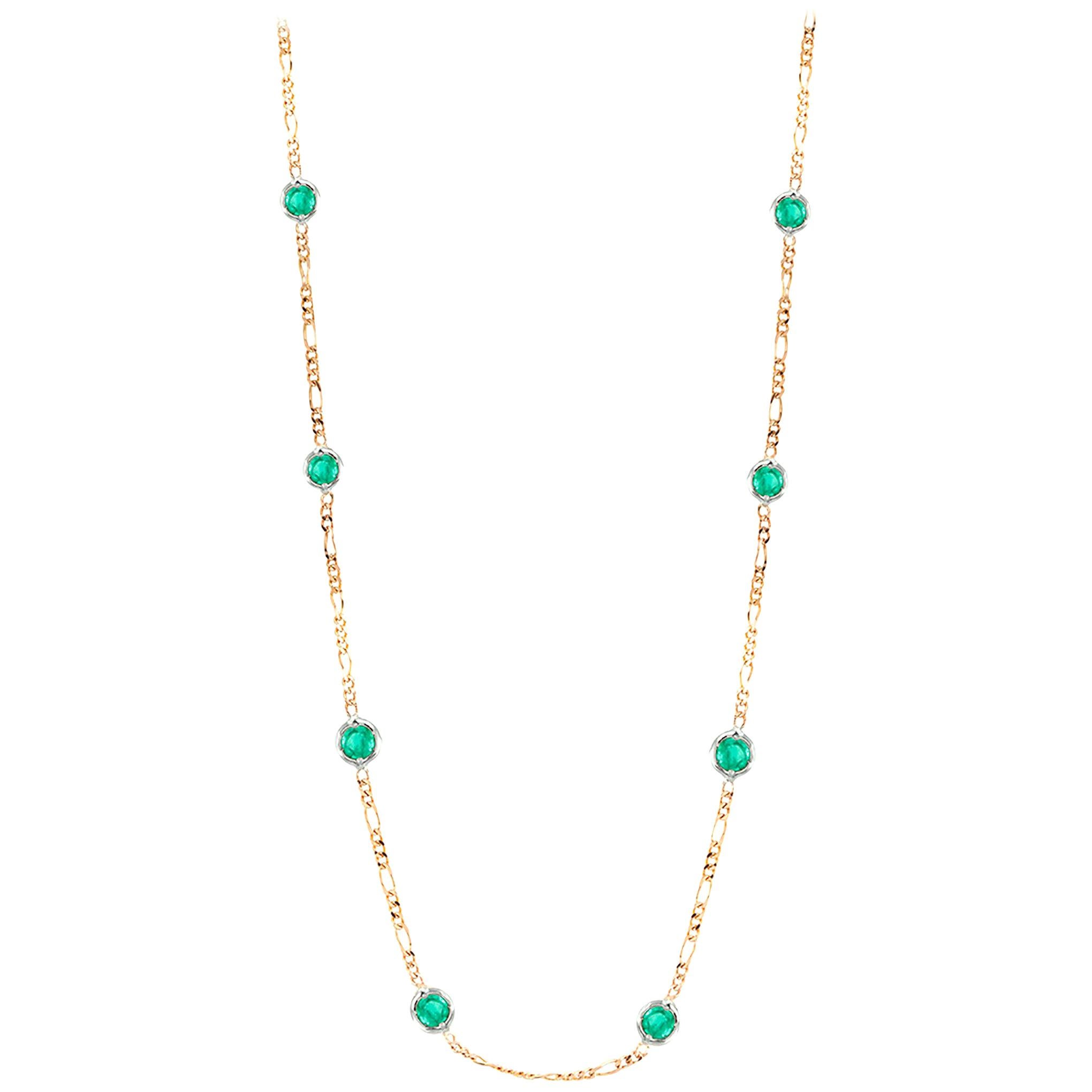 14 karat yellow gold necklace pendant 
Measuring 18 inch long
Seven bezel-set round emeralds weight 1.15 carats 
Width of emeralds measuring 3 millimeter 
Chain necklace with spring lock: a lock that fastens with a spring bolt
New Necklace
Our team