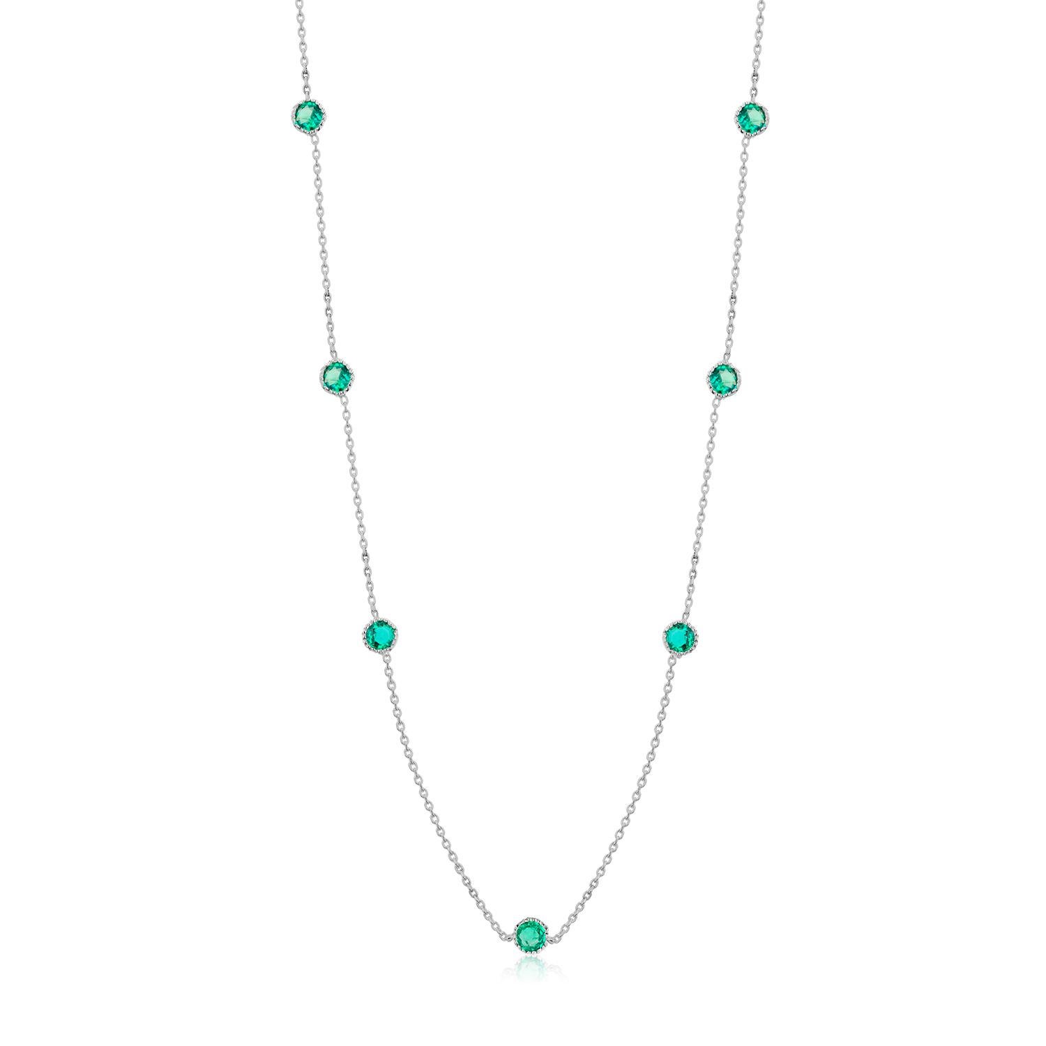 Contemporary Seven Bezel-Set Round Emerald White Gold Necklace Weighing 1.05 Carat