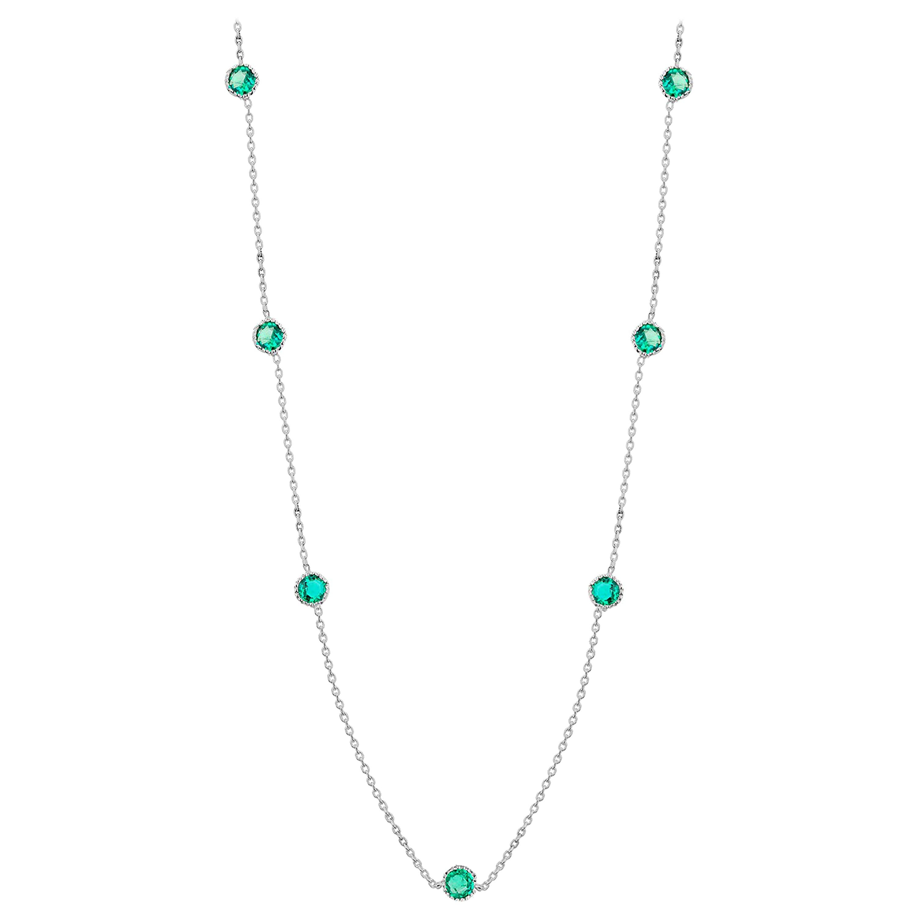 Seven Bezel-Set Round Emerald White Gold Necklace Weighing 1.05 Carat