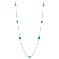 Seven Bezel-Set Round Emerald White Gold Necklace Weighing 1.05 Carat