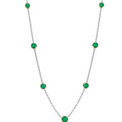 Seven Bezel-Set Round Emerald Yellow and White Gold Necklace Weighing 1.20 Carat