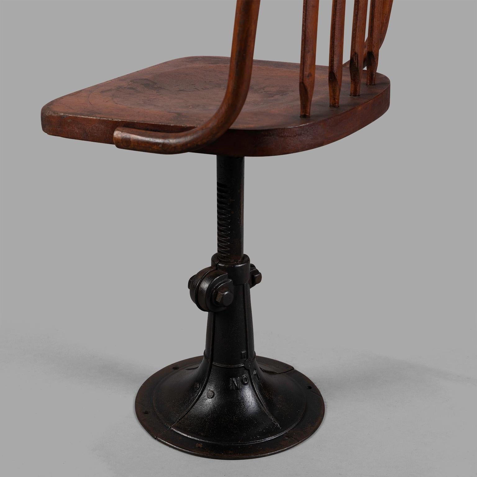 Seven Cast Iron and Wood Adjustable Height Chairs, circa 1895 For Sale 1