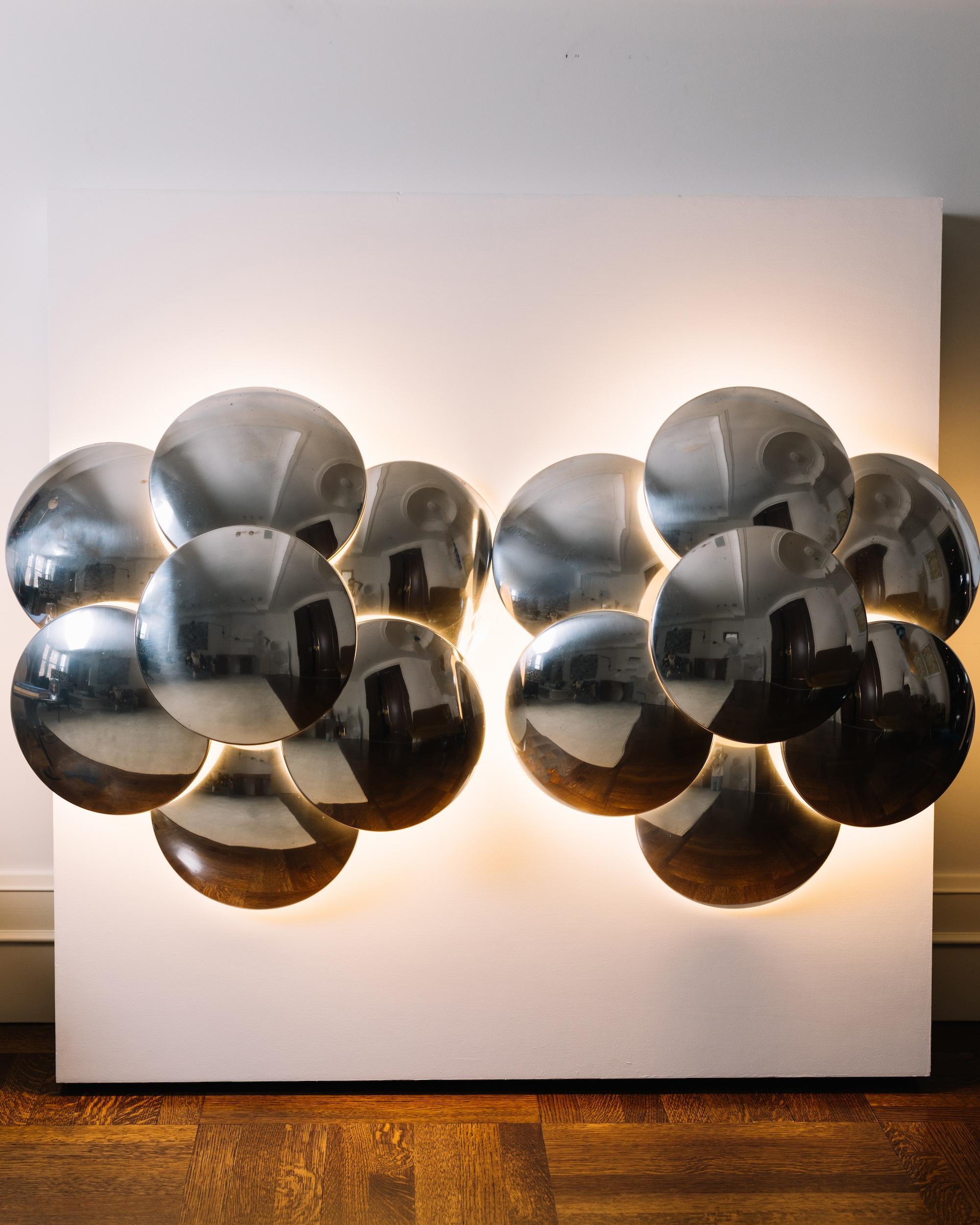 Origin
Italy, circa 1970s

Materials
Polished chrome

Dimensions
27.6 in D × 5.9 in W (70 cm × 15 cm)

Condition
Very good vintage condition. Professionally rewired for U.S. standards (110–120V).

A rare and sculptural pair of seven-disc wall