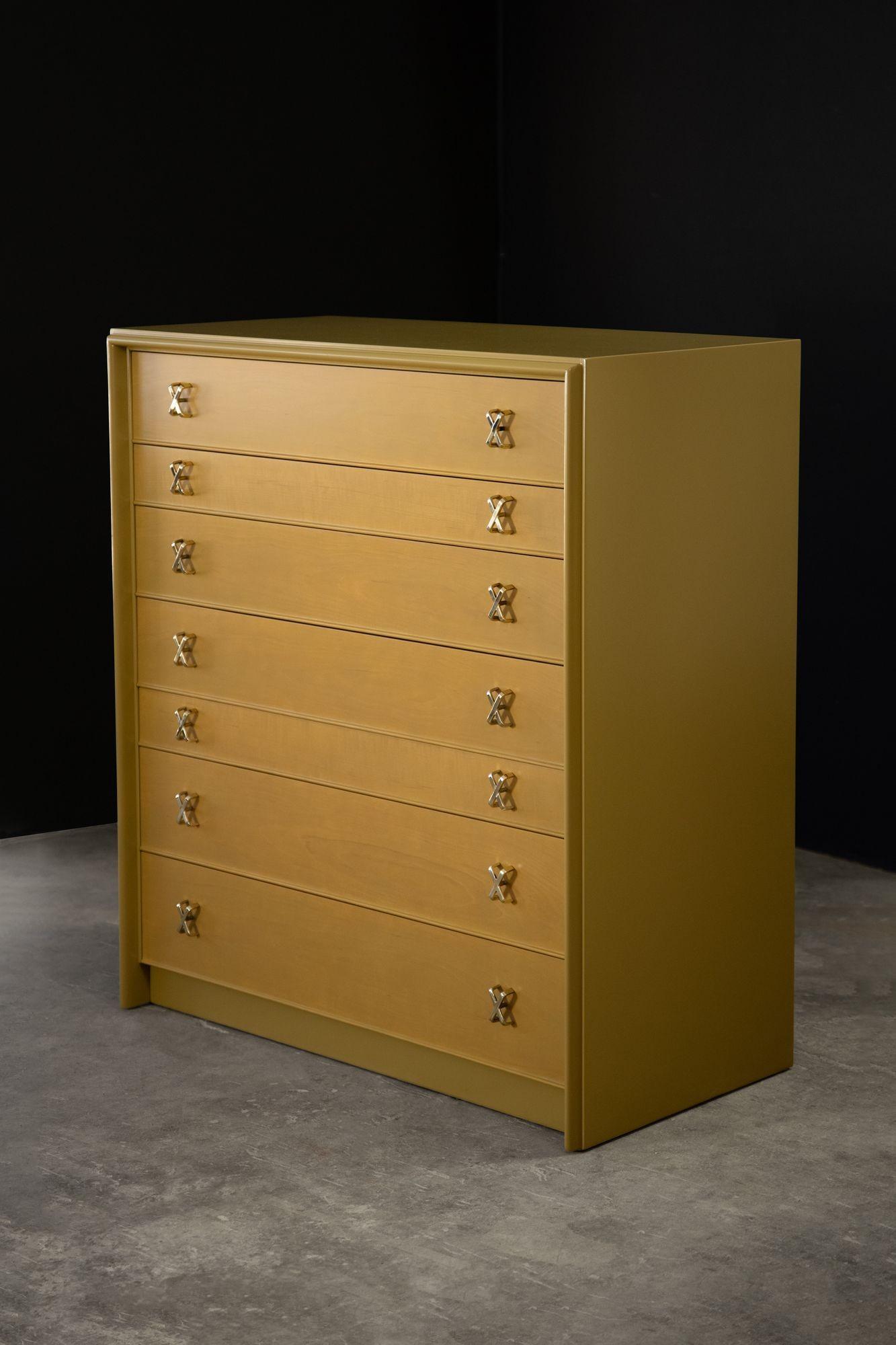 Beautiful seven-drawer chest designed by Paul T. Frankl for Johnson Furniture. In excellent condition, restored in a beautiful lacquer with solid brass 'X's which have been professionally polished. *We have a matching dresser in a separate listing.