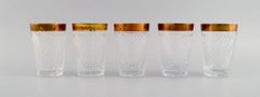 Seven Drinking Glasses in Mouth-Blown Crystal Glass with Gold Edge, 1930's