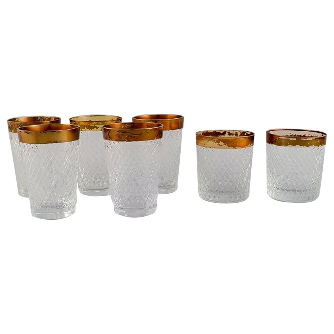 Seven Drinking Glasses in Mouth-Blown Crystal Glass with Gold Edge, 1930's For Sale