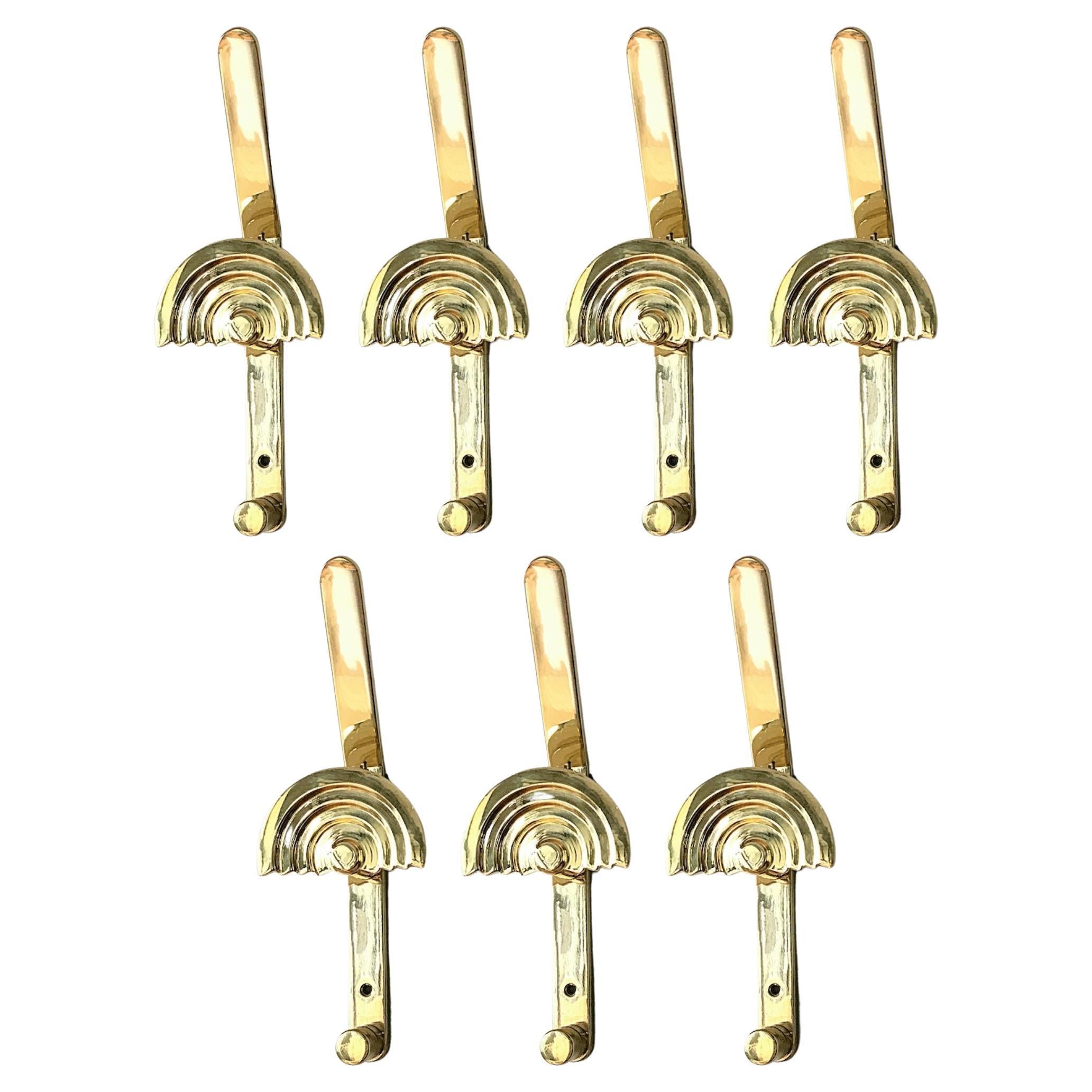 Seven Ettore Sottsass "Quattro Se Sunburst" Brass Coat Wall Hooks, 1980s, Italy